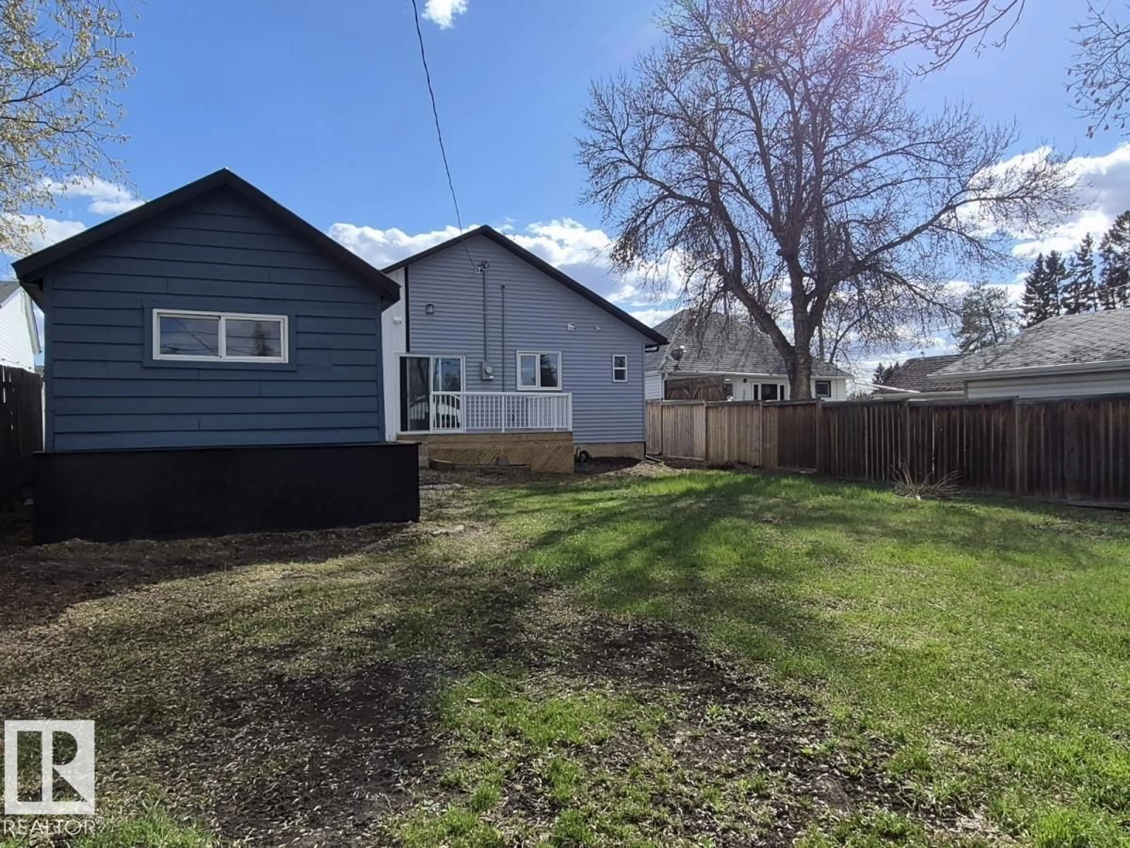 A pic from outside/outdoor area/front of a property/back of a property/a pic from drone, street for 5032 55 AV, Tofield Alberta T0B4J0