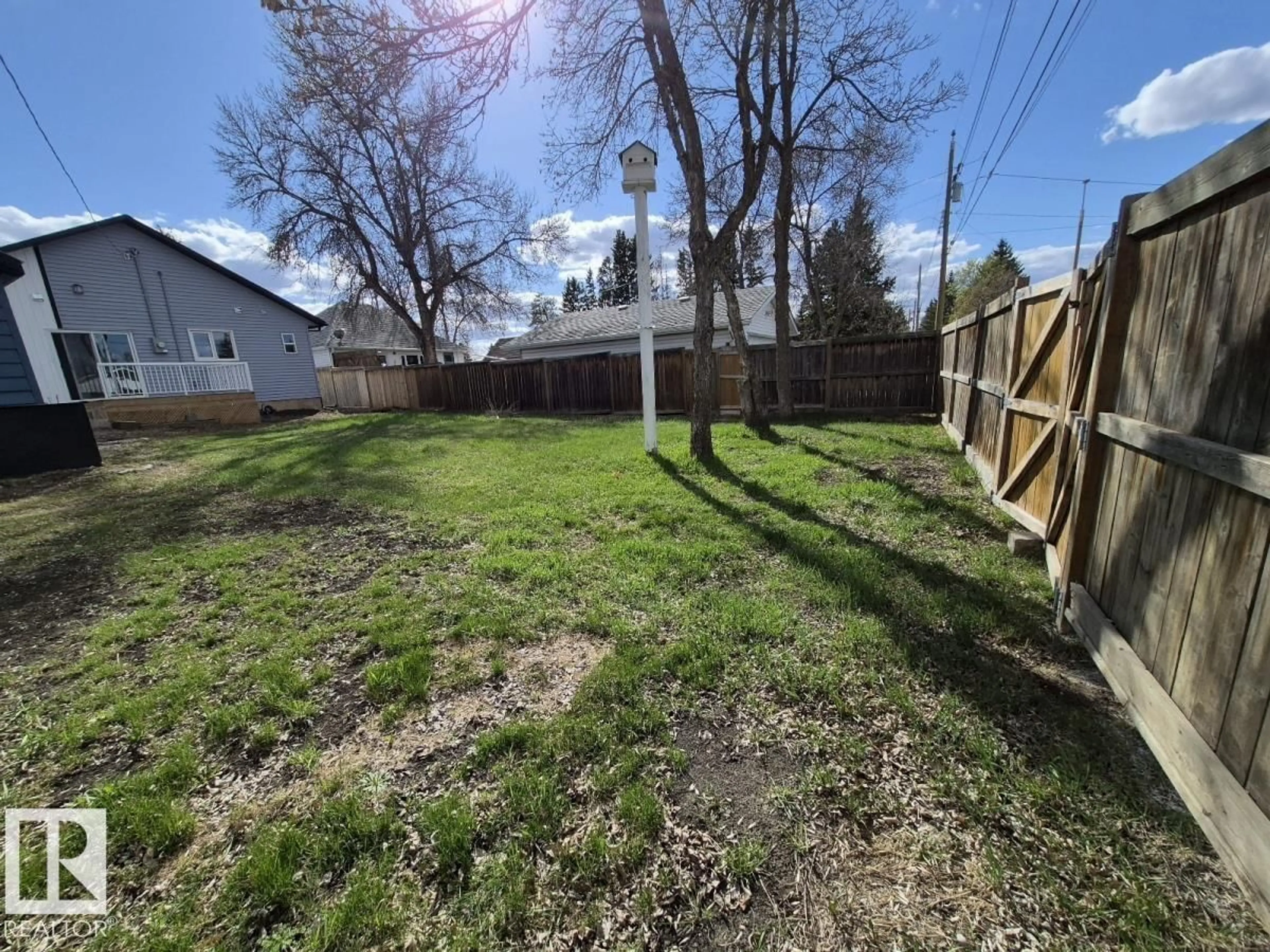 A pic from outside/outdoor area/front of a property/back of a property/a pic from drone, street for 5032 55 AV, Tofield Alberta T0B4J0