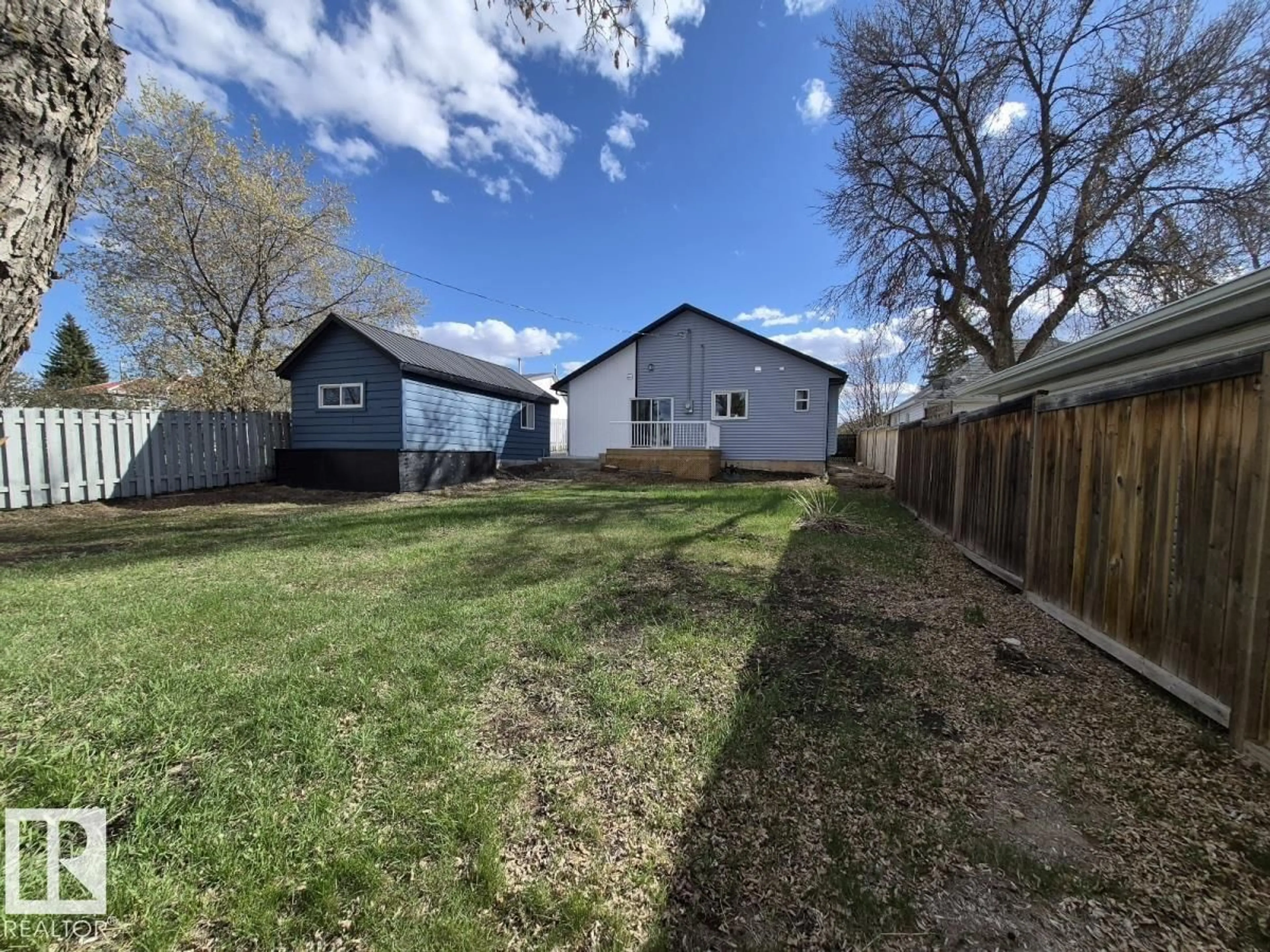 A pic from outside/outdoor area/front of a property/back of a property/a pic from drone, street for 5032 55 AV, Tofield Alberta T0B4J0