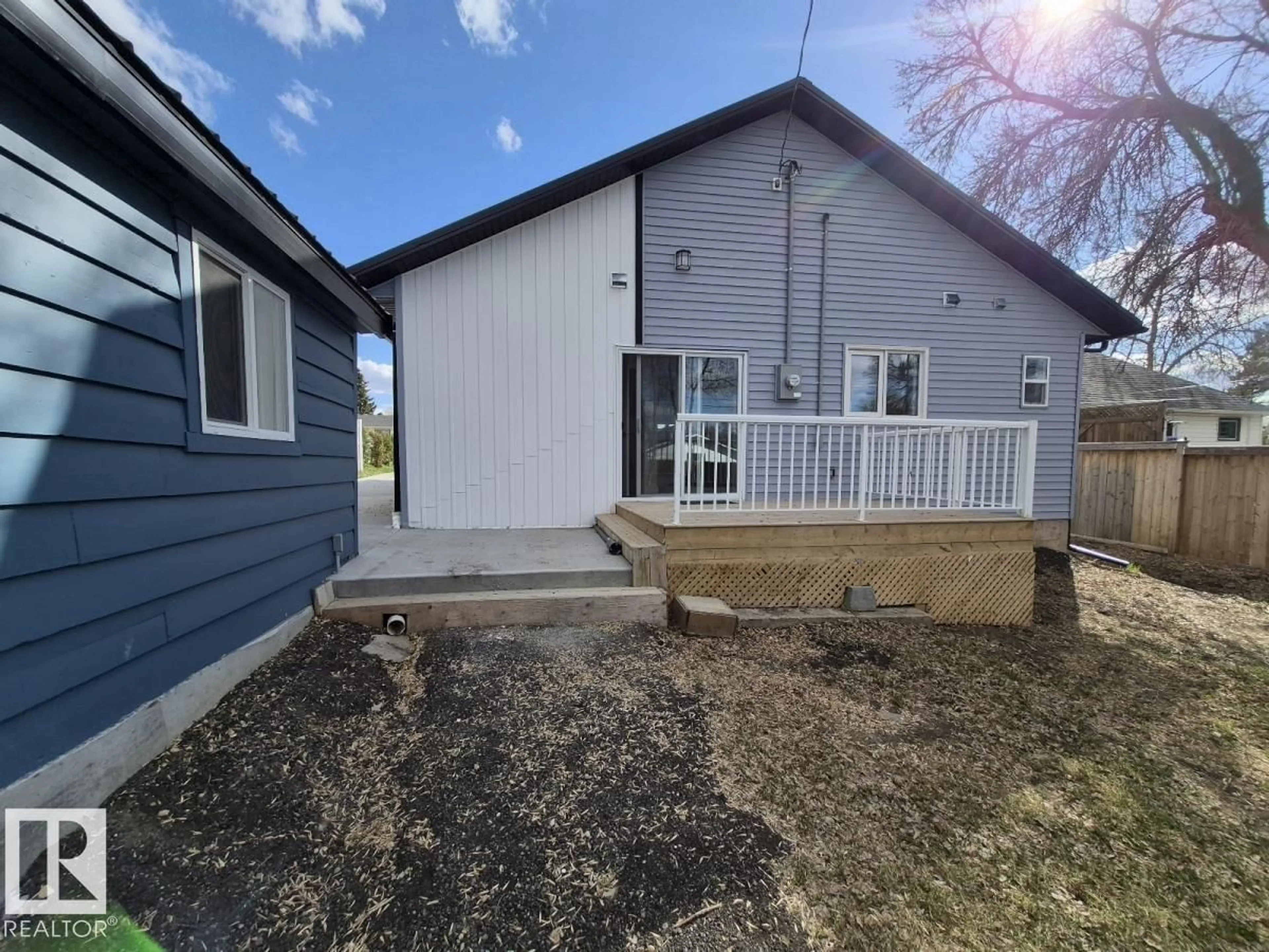 Home with vinyl exterior material, street for 5032 55 AV, Tofield Alberta T0B4J0