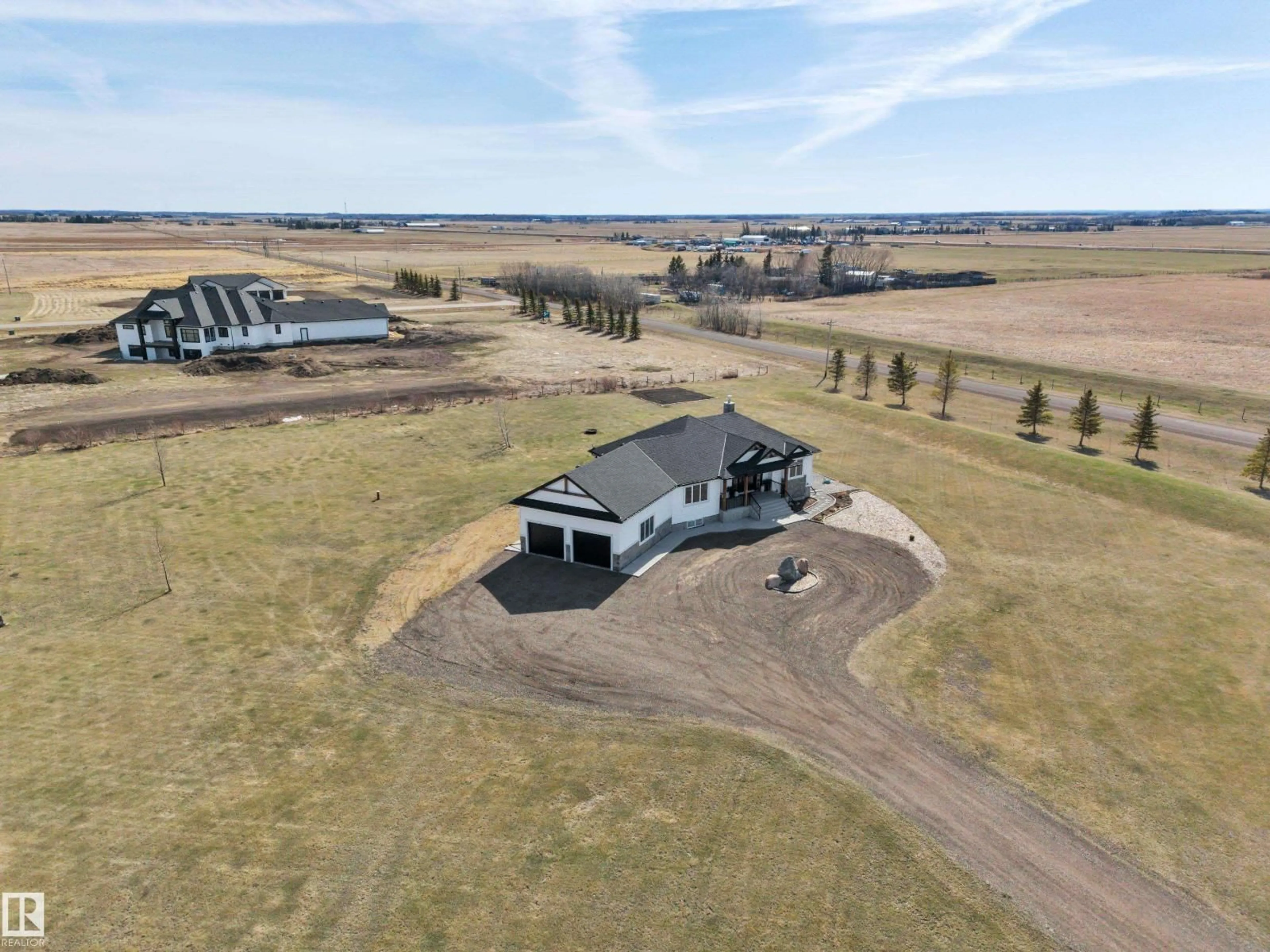 A pic from outside/outdoor area/front of a property/back of a property/a pic from drone, building for 10 - 49035 RGE RD 250, Rural Leduc County Alberta T4X2B9
