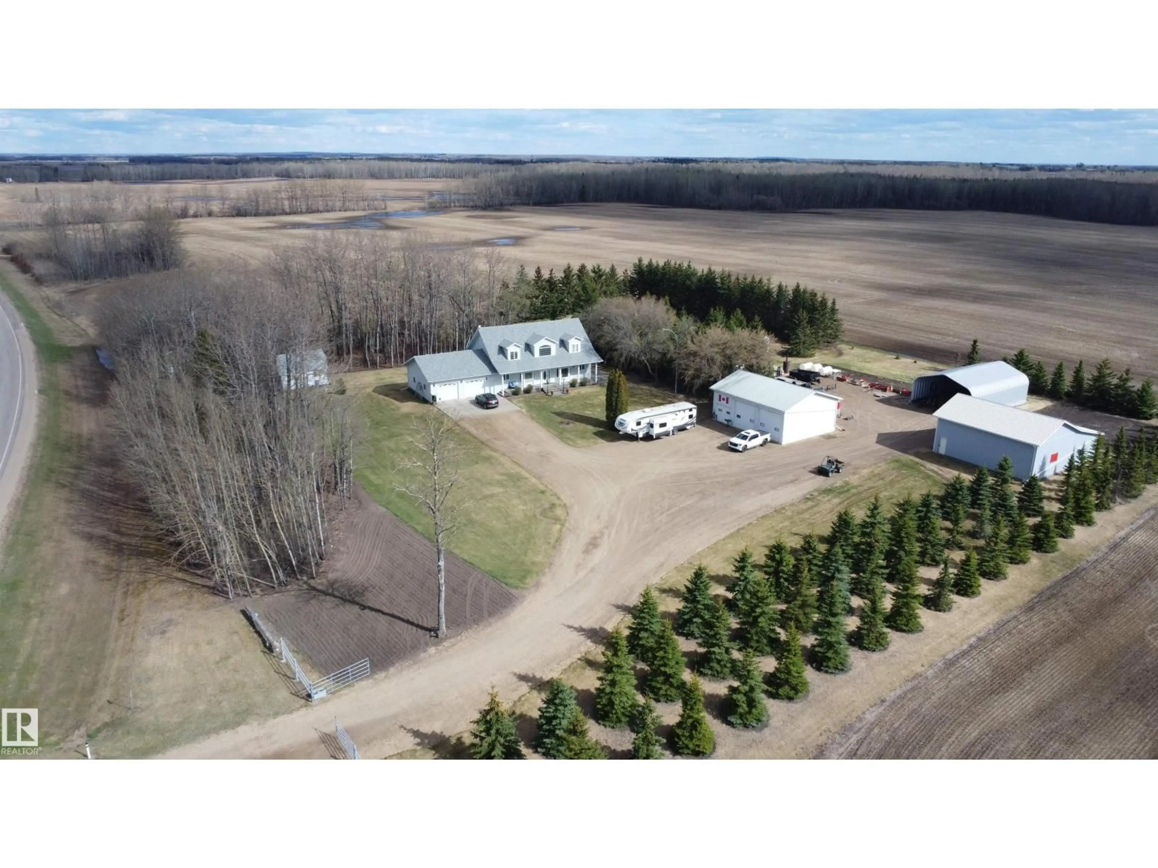 A pic from outside/outdoor area/front of a property/back of a property/a pic from drone, building for 25525 HWY 661, Rural Westlock County Alberta T0G0S0