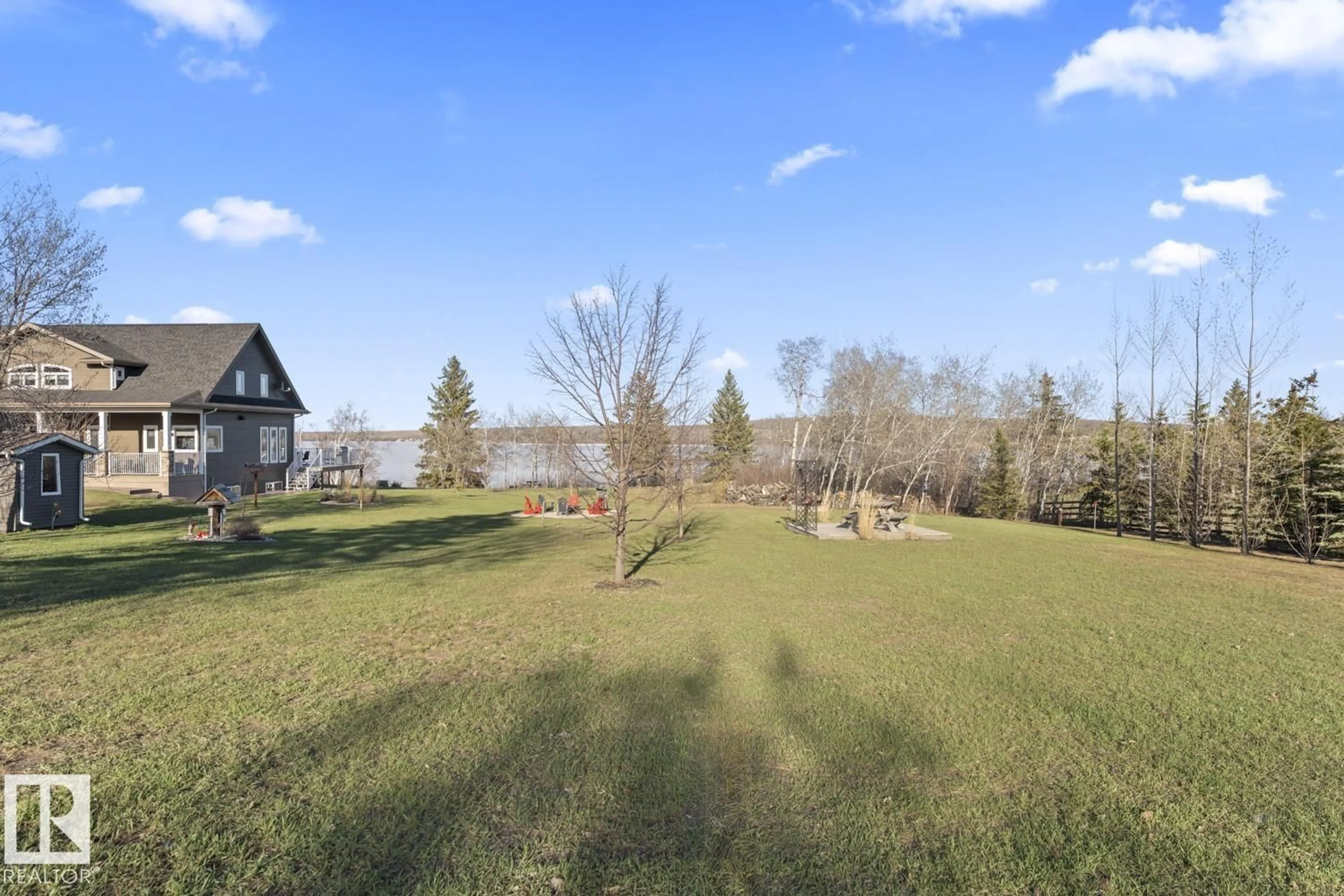 A pic from outside/outdoor area/front of a property/back of a property/a pic from drone, water/lake/river/ocean view for #3 - 46526 TWP ROAD 604 A, Rural Bonnyville M.D. Alberta T9N2J1