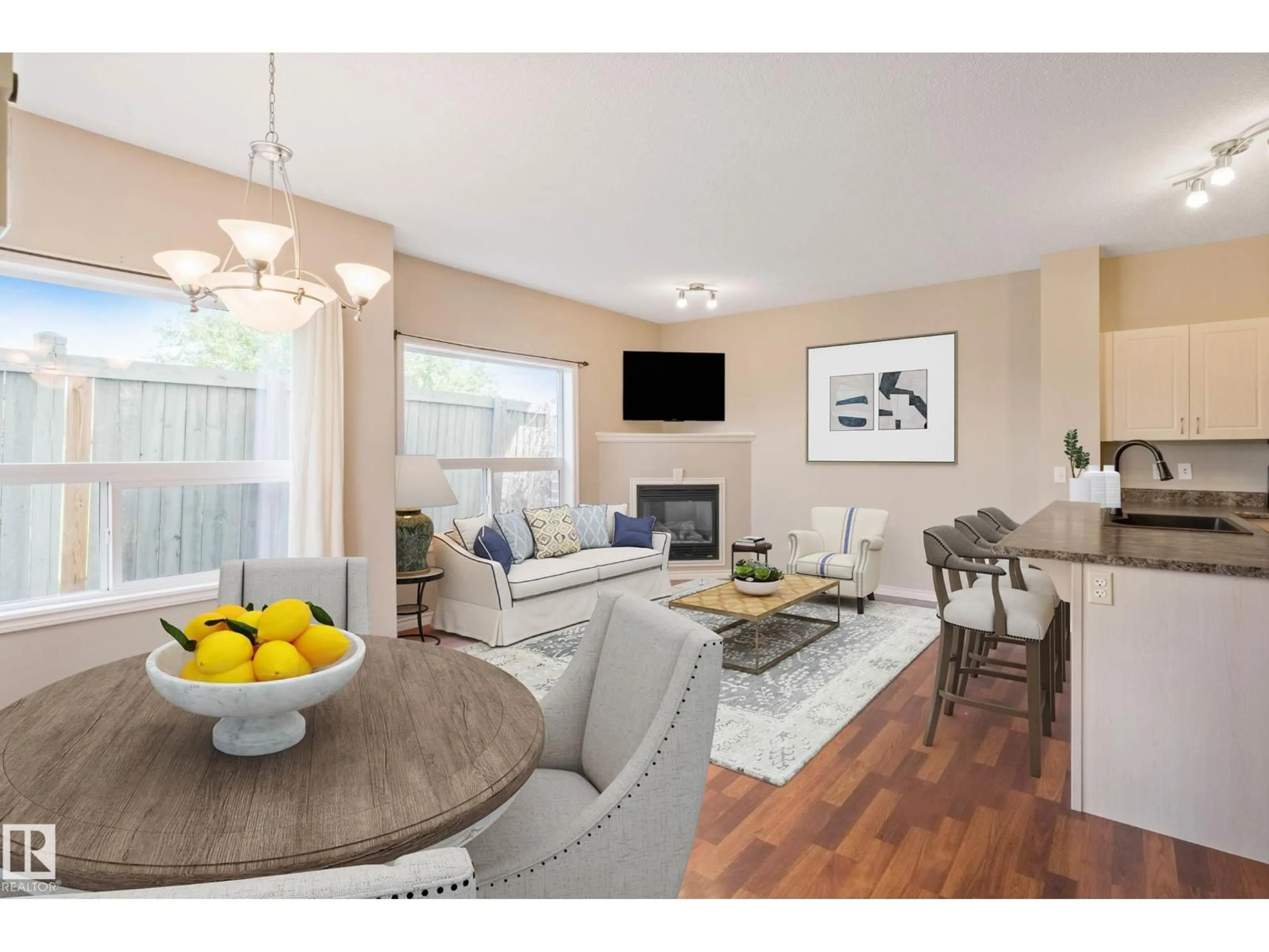 Living room with furniture, wood/laminate floor for 59 - 3010 33 AV NW, Edmonton Alberta T6T0C3