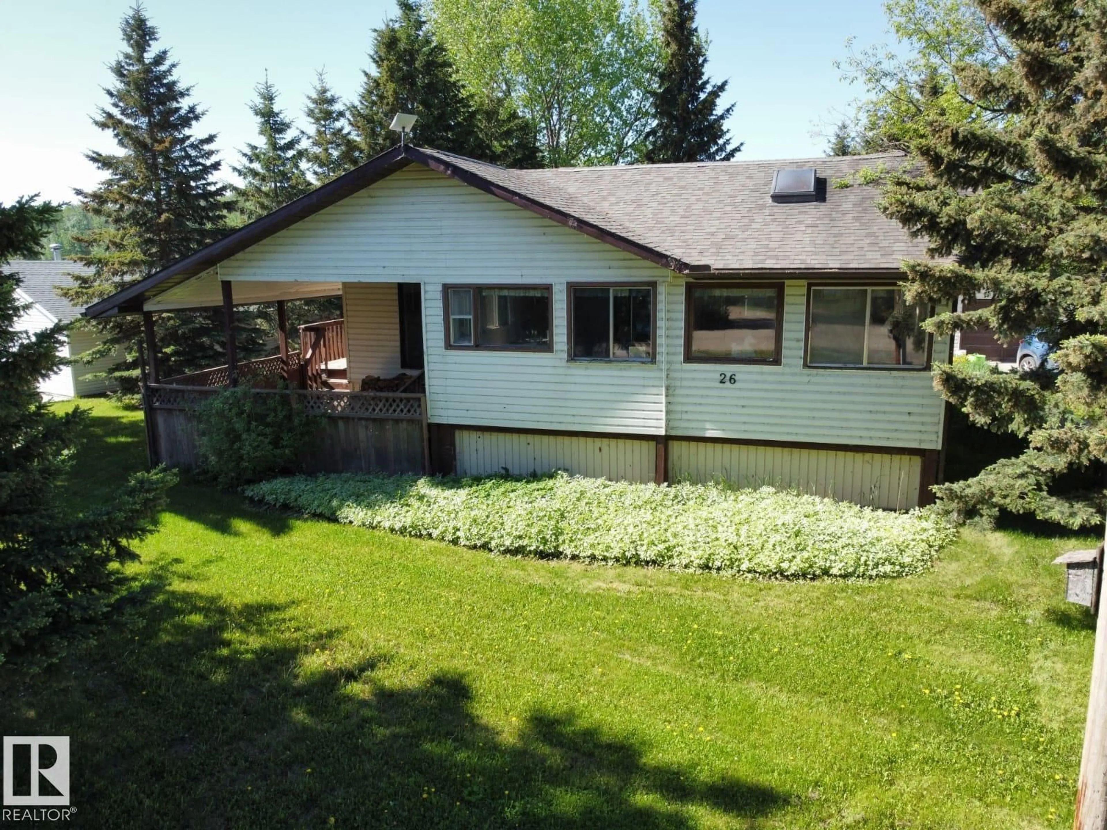 A pic from outside/outdoor area/front of a property/back of a property/a pic from drone, street for 26 LAKESHORE DR, Rural Wetaskiwin County Alberta T0C2V0