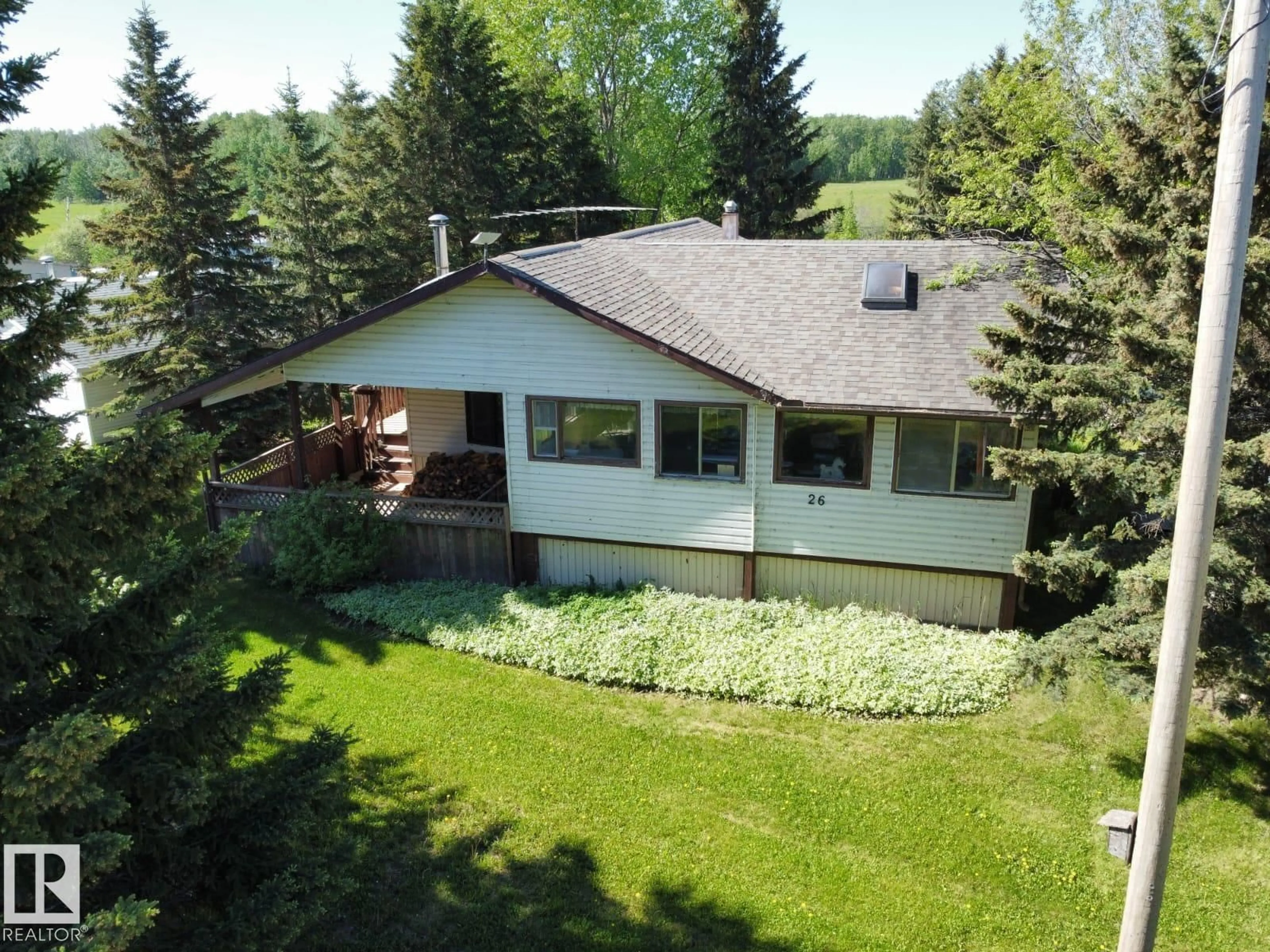 A pic from outside/outdoor area/front of a property/back of a property/a pic from drone, mountain view for 26 LAKESHORE DR, Rural Wetaskiwin County Alberta T0C2V0