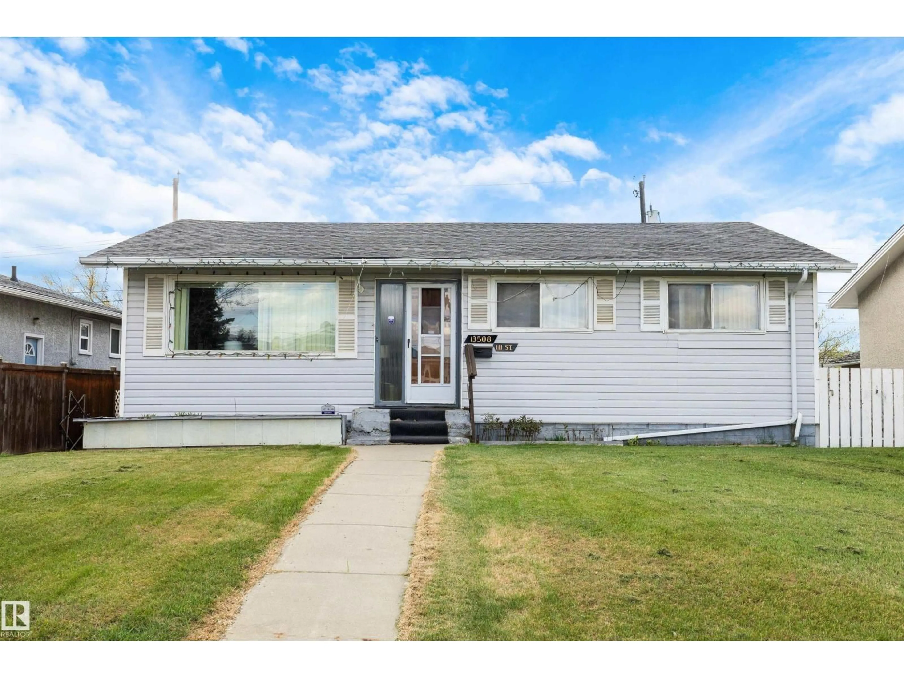 Home with vinyl exterior material, street for NW - 13508 111 ST, Edmonton Alberta T5E4Z8