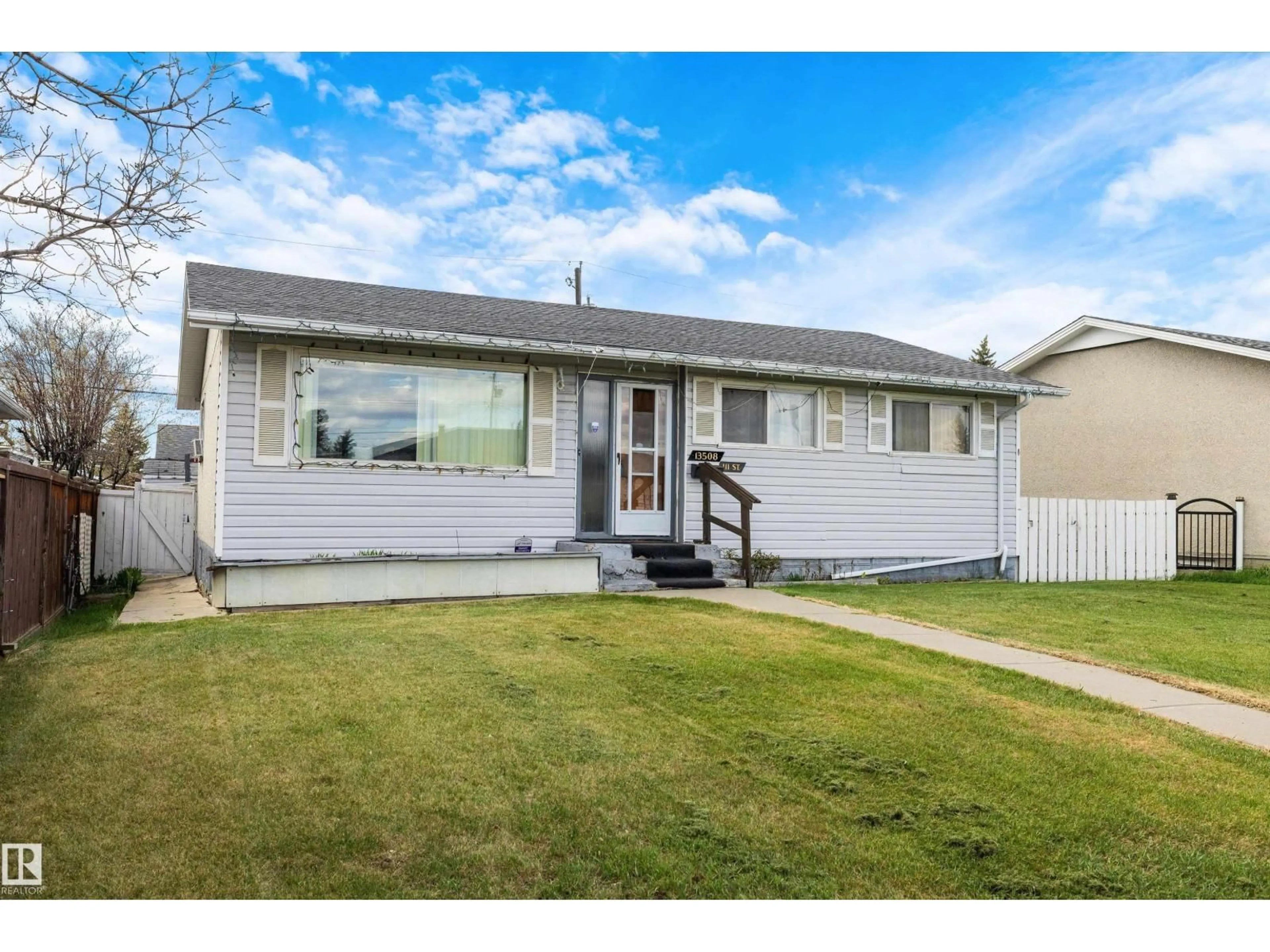 Home with vinyl exterior material, street for NW - 13508 111 ST, Edmonton Alberta T5E4Z8
