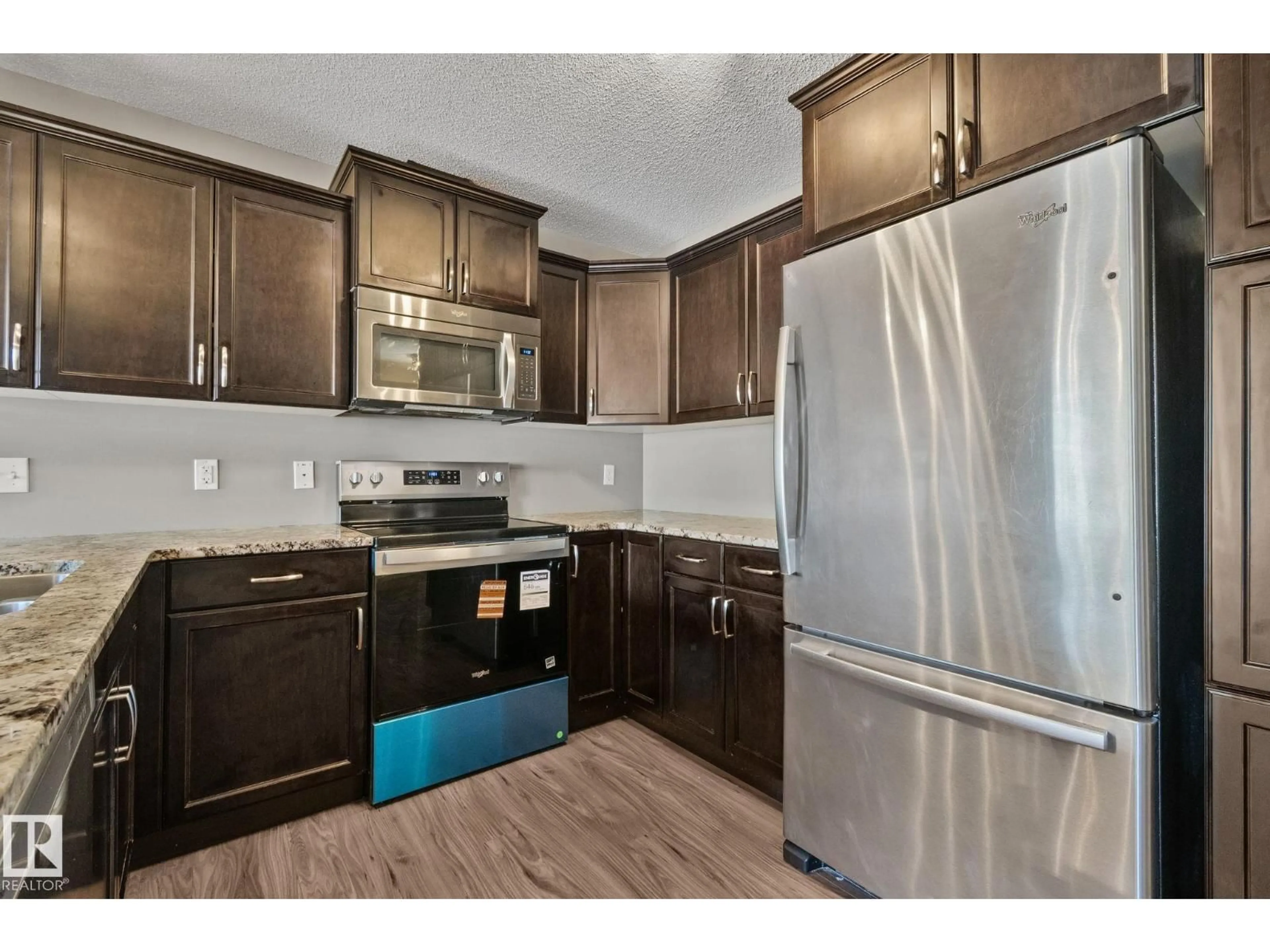 Standard kitchen, wood/laminate floor for 445 - 46 BRINTNELL BV, Edmonton Alberta T5Y0V5