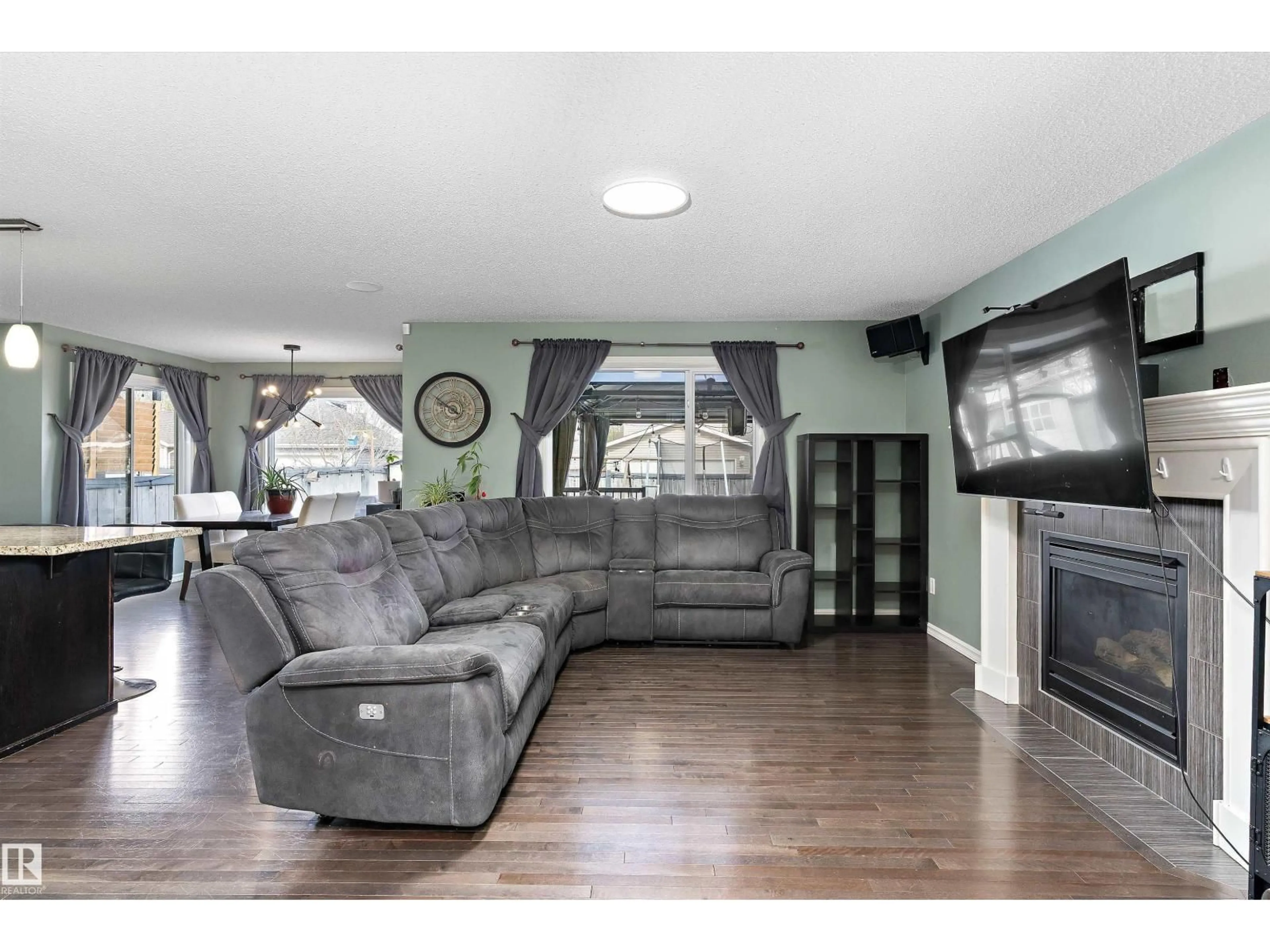 Living room with furniture, unknown for 1332 72 ST, Edmonton Alberta T6X0H2