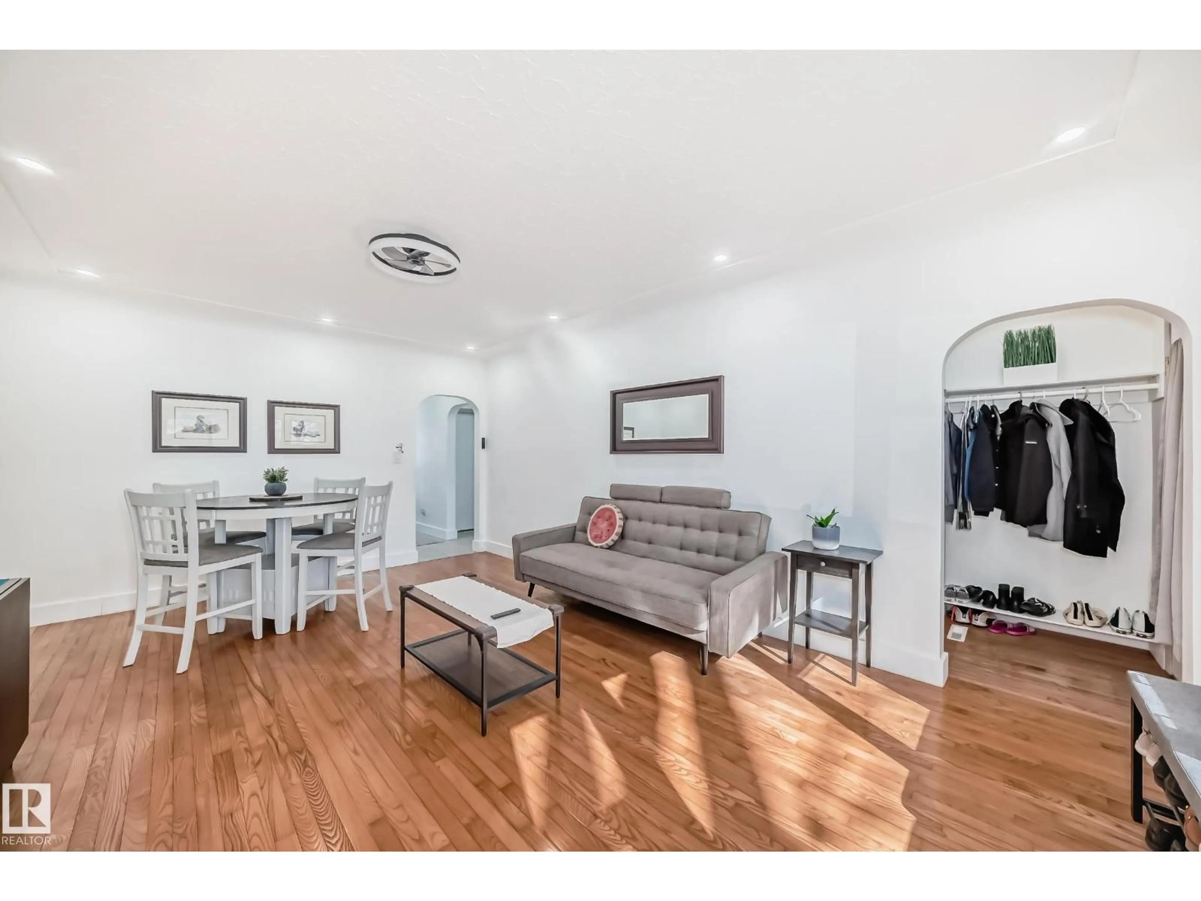 Living room with furniture, wood/laminate floor for NW - 11926 77 ST, Edmonton Alberta T5B2G4