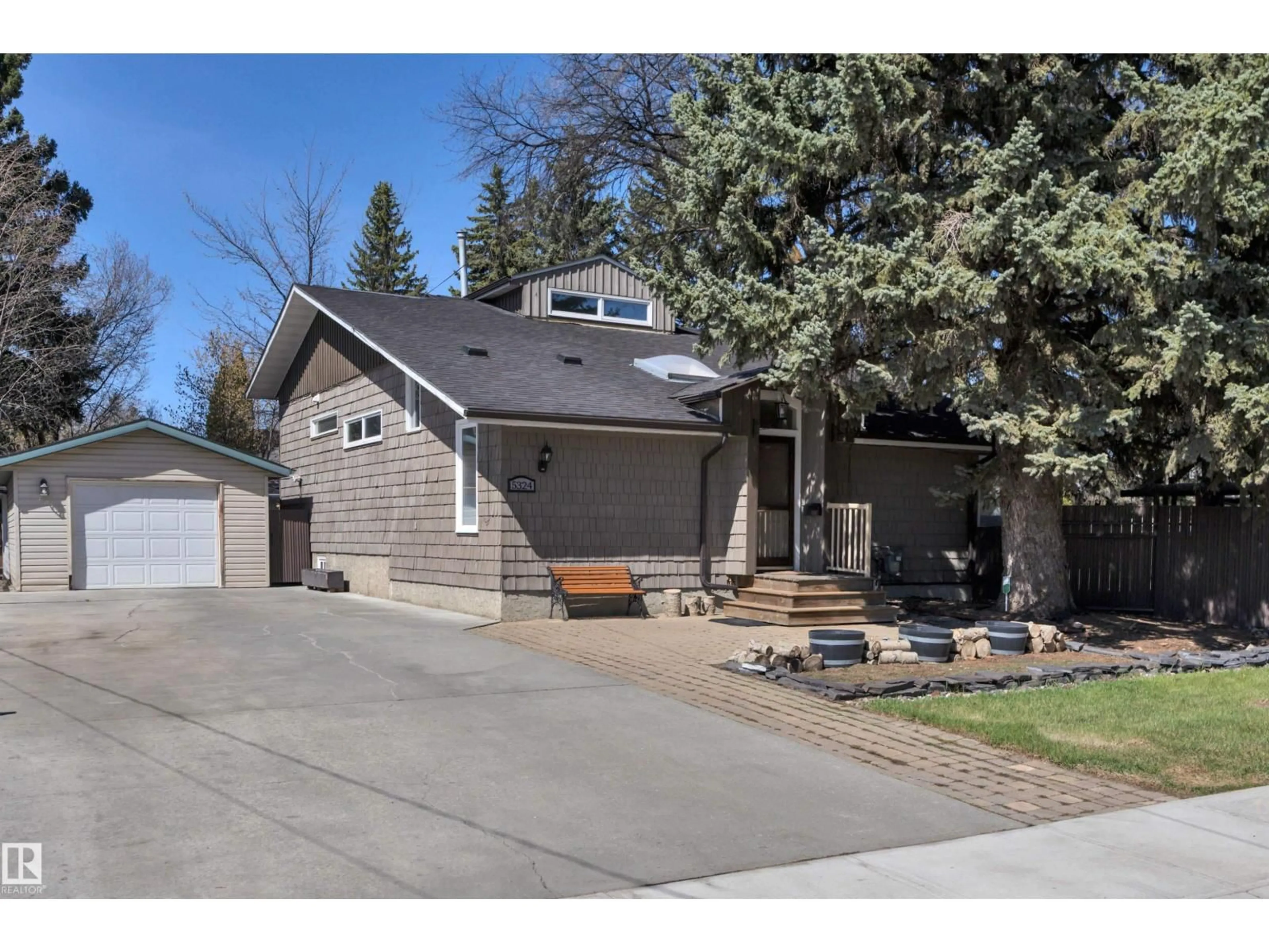 Home with vinyl exterior material, street for 5324 109 ST, Edmonton Alberta T6H3A4