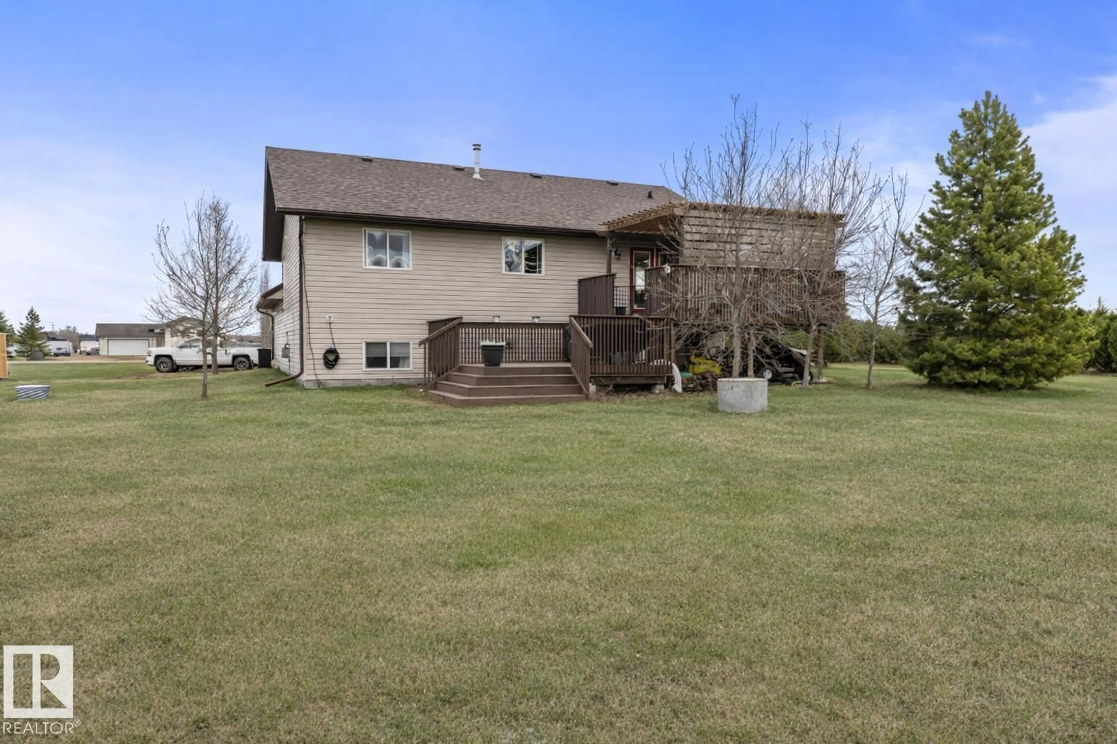 A pic from outside/outdoor area/front of a property/back of a property/a pic from drone, water/lake/river/ocean view for #10 - 42310 TWP RD 632, Rural Bonnyville M.D. Alberta T9M1P2
