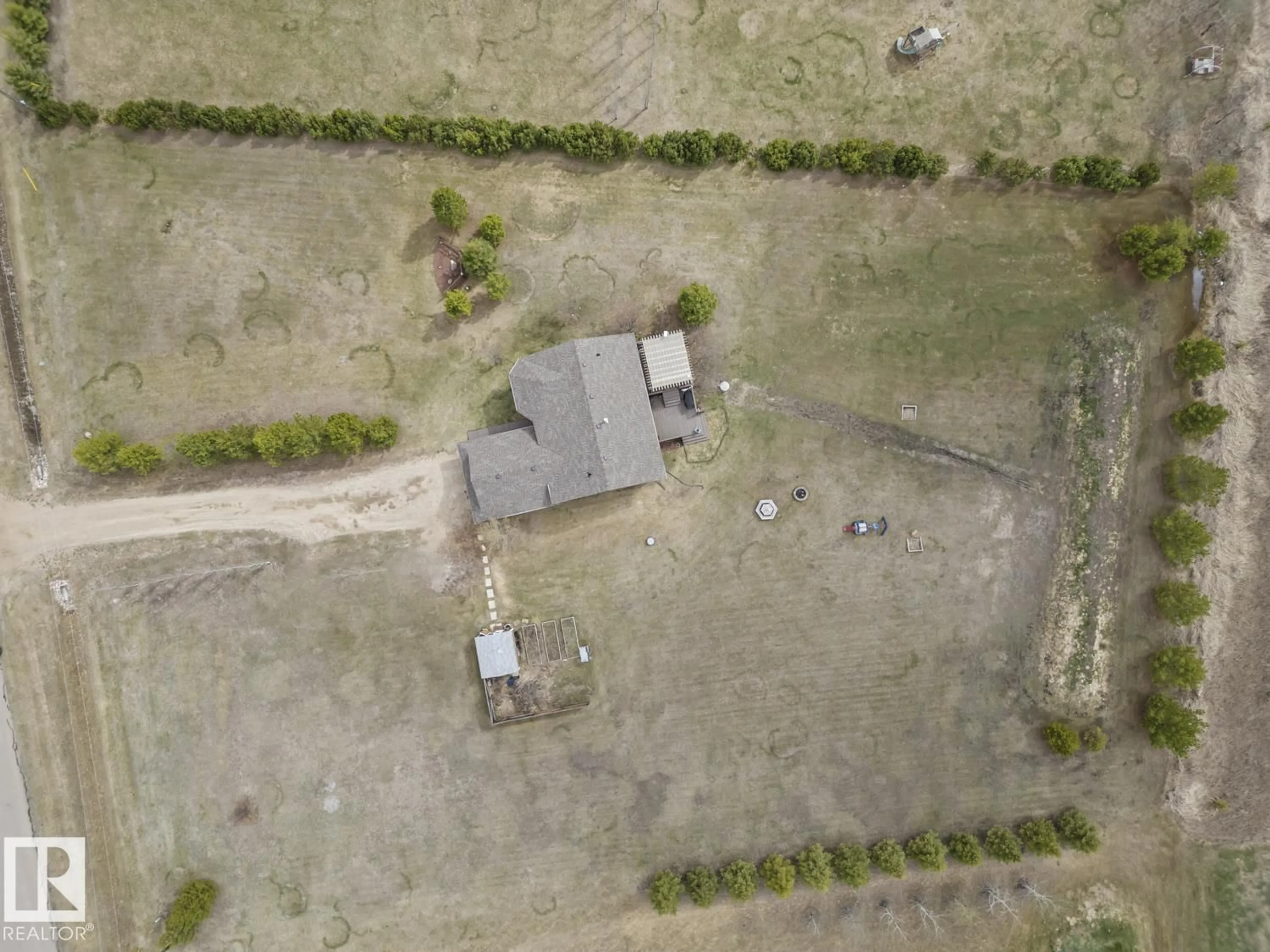 A pic from outside/outdoor area/front of a property/back of a property/a pic from drone, building for #10 - 42310 TWP RD 632, Rural Bonnyville M.D. Alberta T9M1P2