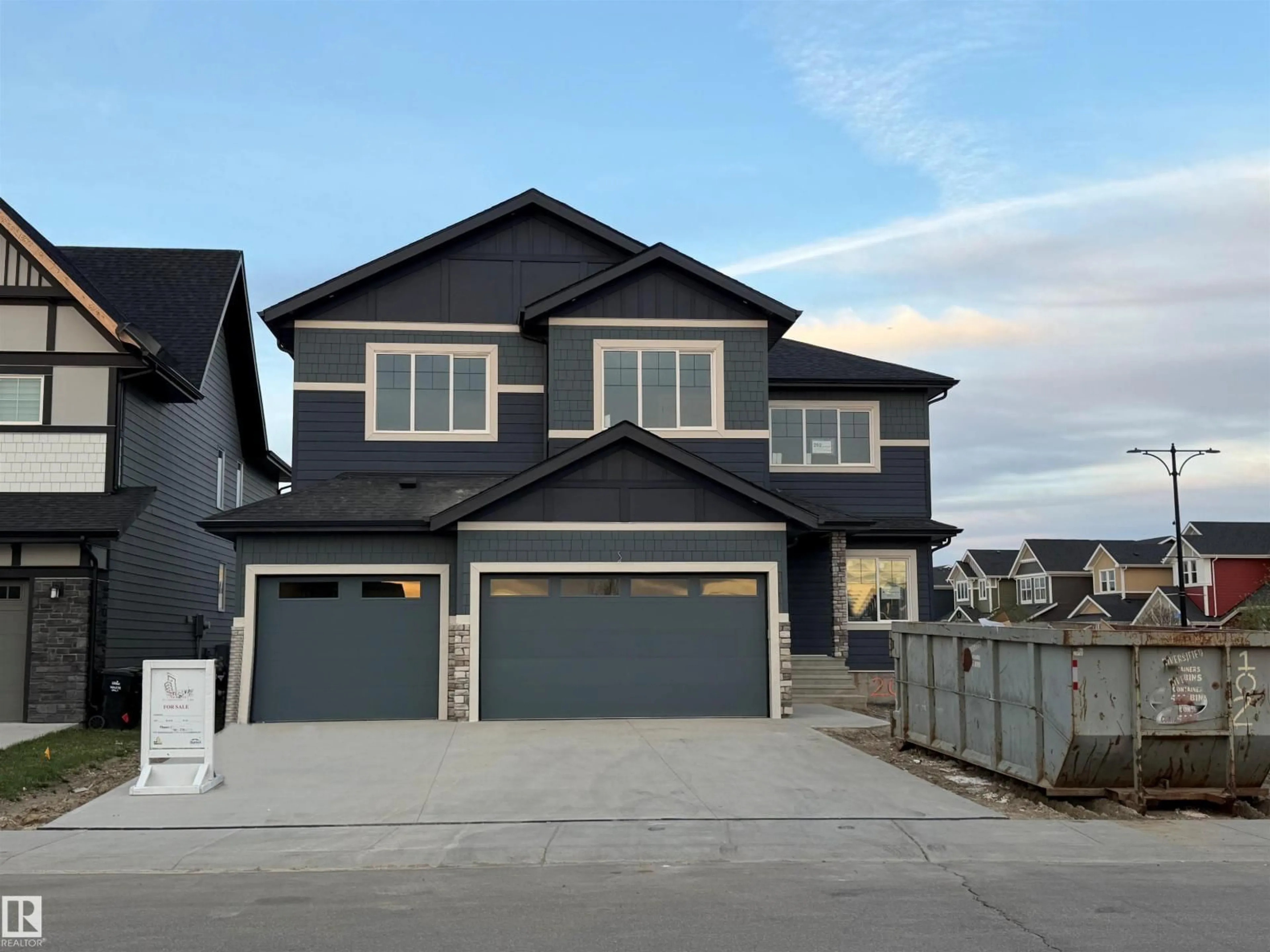 Home with vinyl exterior material, street for 202 EDGEWATER CI, Leduc Alberta T9E1K5