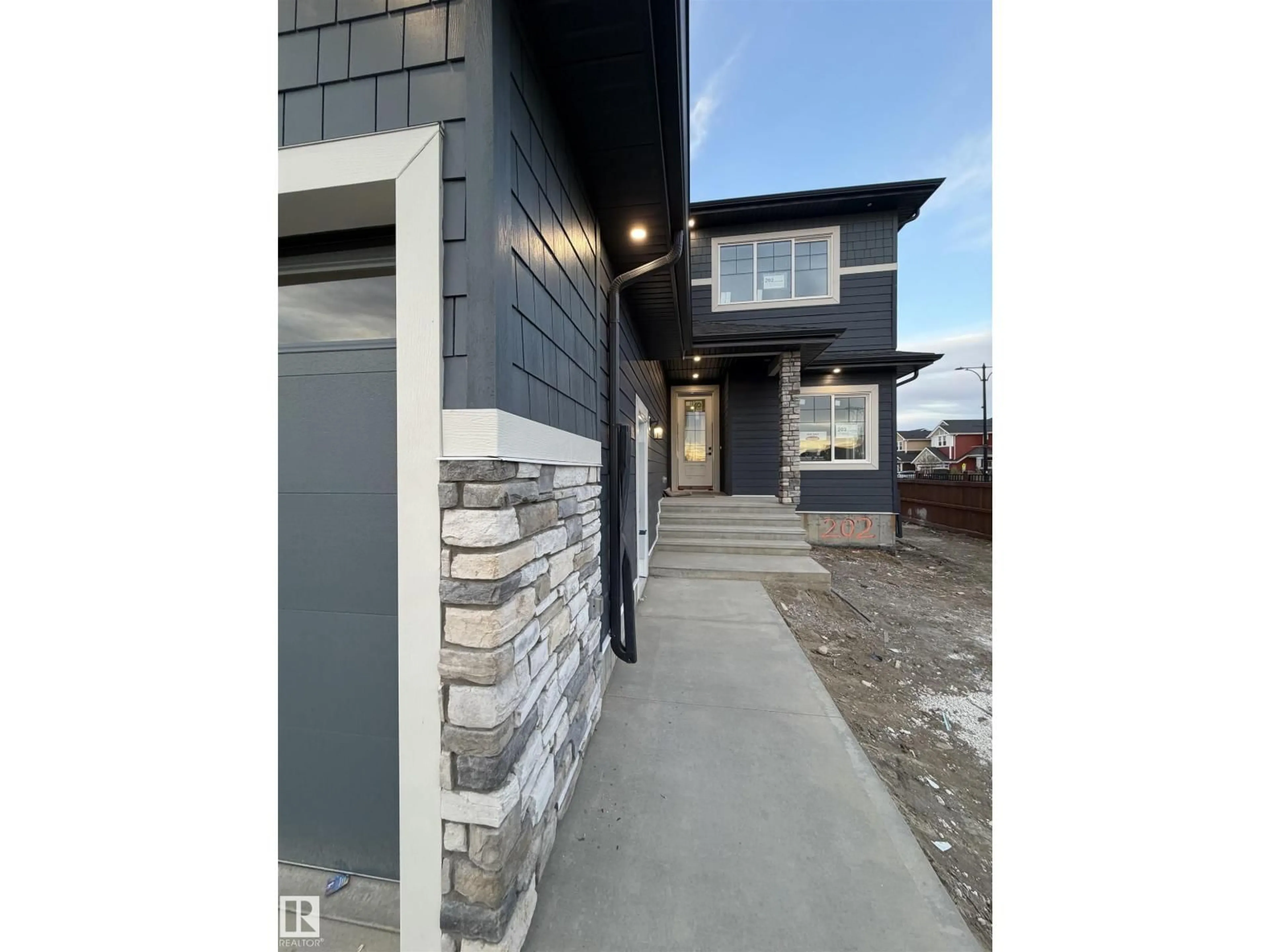 Home with brick exterior material, street for 202 EDGEWATER CI, Leduc Alberta T9E1K5