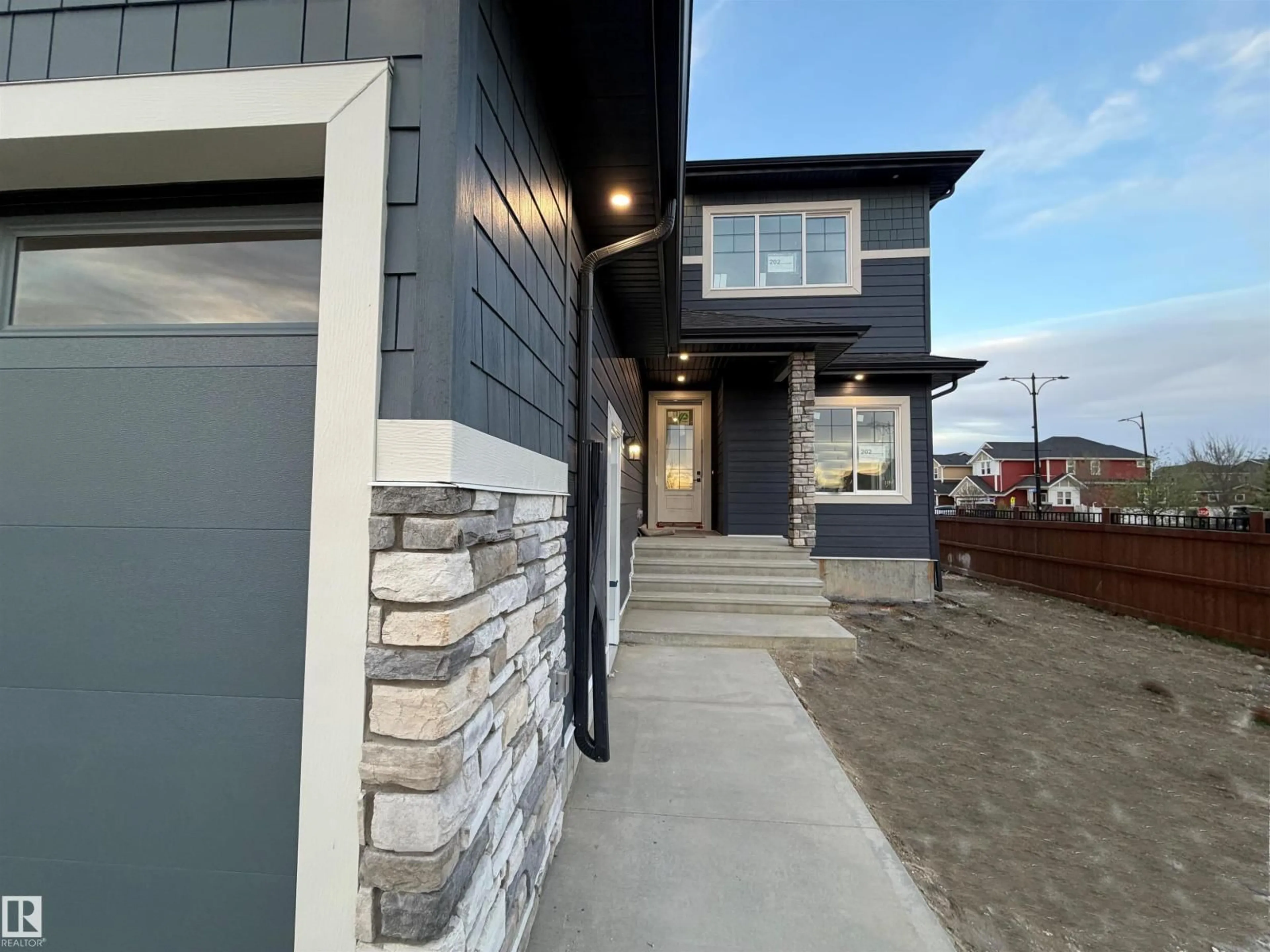 Home with brick exterior material, street for 202 EDGEWATER CI, Leduc Alberta T9E1K5