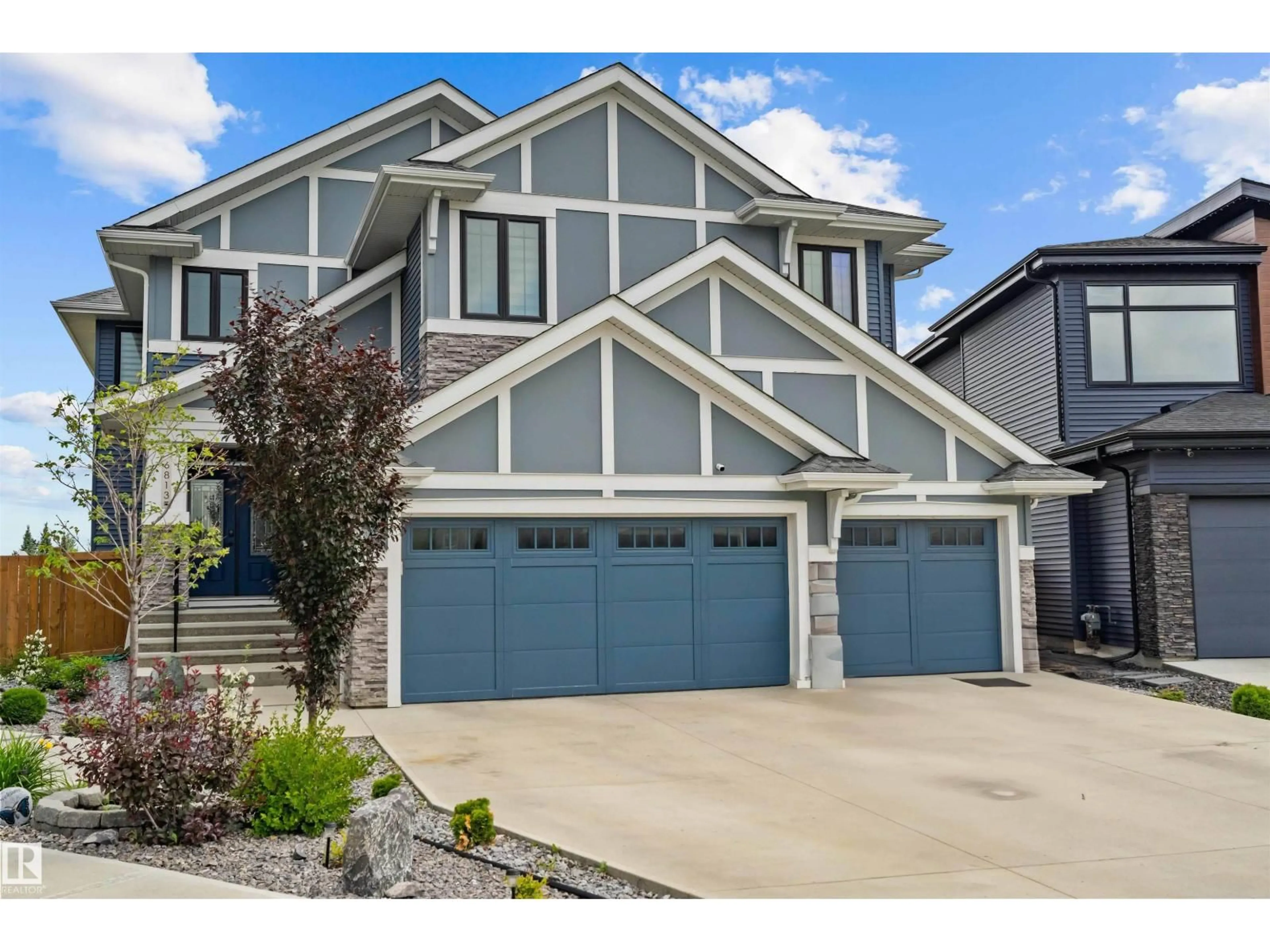 Home with vinyl exterior material, street for SW - 6813 KNOX LO, Edmonton Alberta T6W4R3