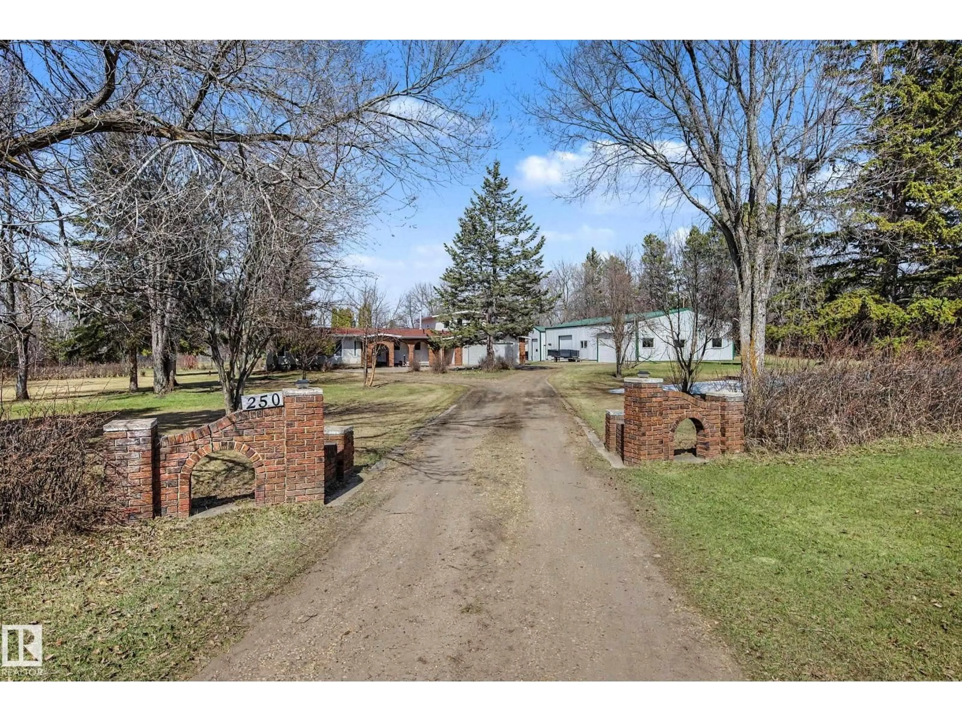 A pic from outside/outdoor area/front of a property/back of a property/a pic from drone, water/lake/river/ocean view for NE - 250 197 AV, Edmonton Alberta T5Y6M8