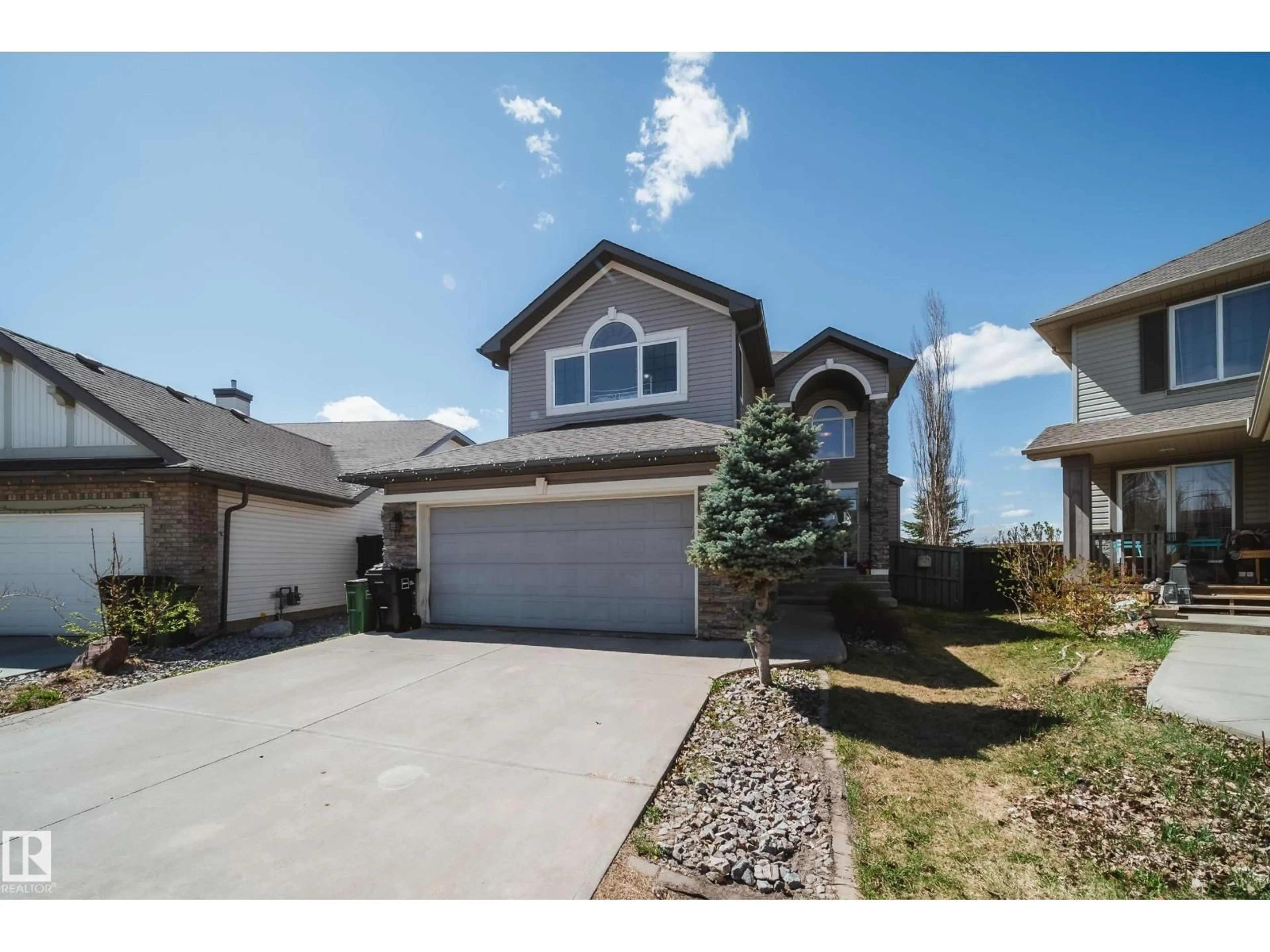 Home with vinyl exterior material, street for 12627 16 AV, Edmonton Alberta T6W1R6