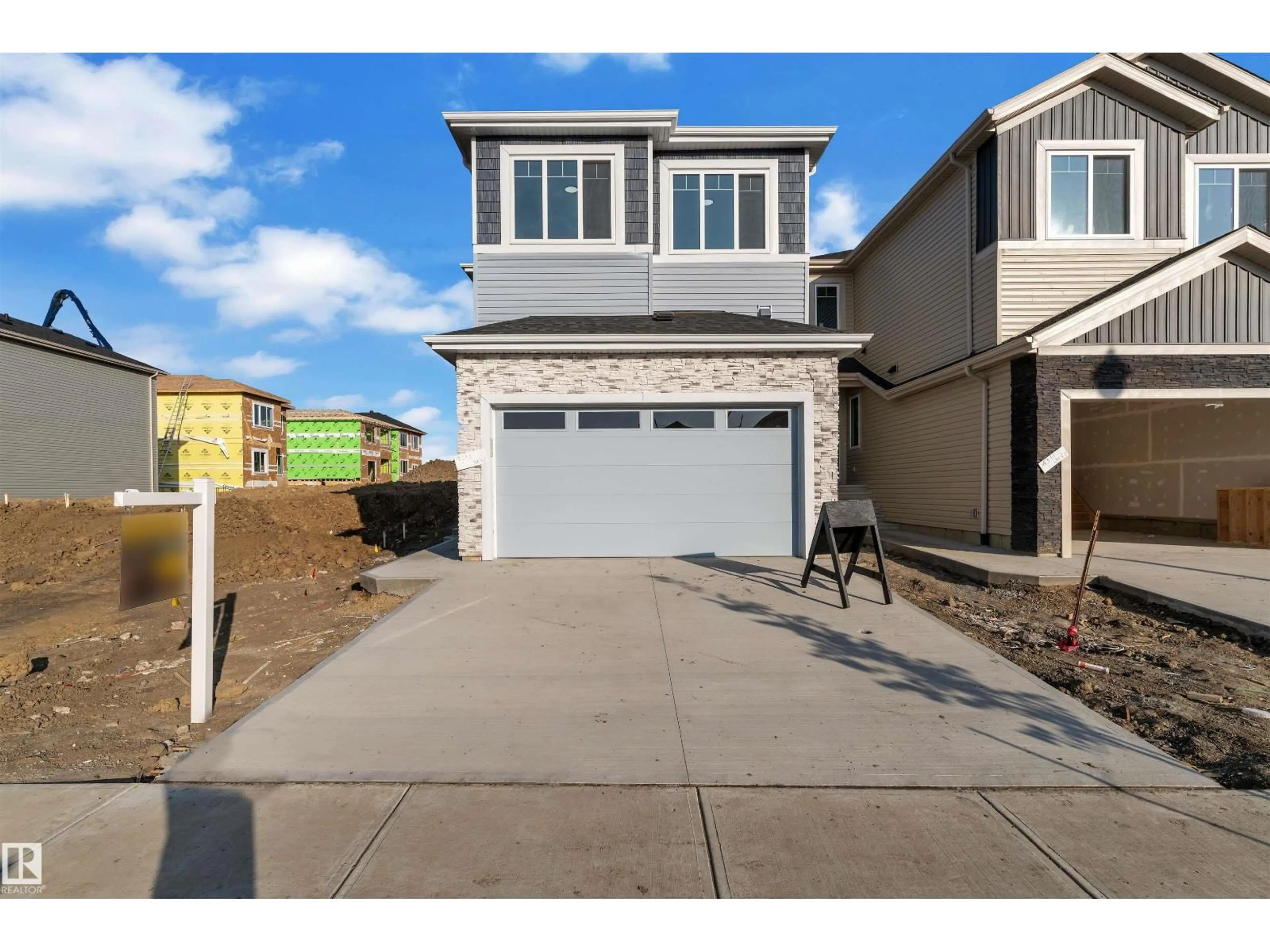 Home with vinyl exterior material, street for 22815 80 AV, Edmonton Alberta T5T7X8