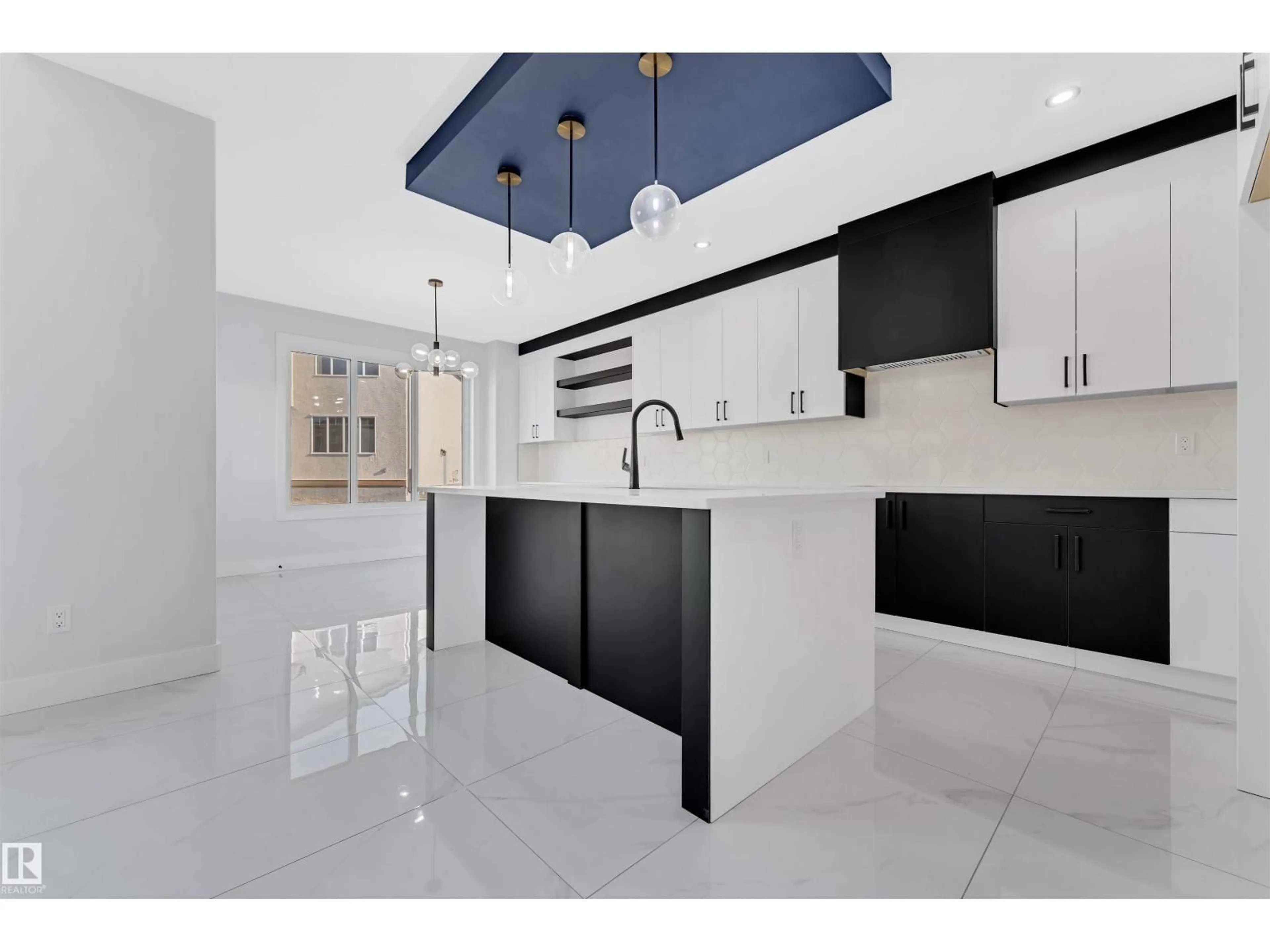 Open concept kitchen, ceramic/tile floor for 22815 80 AV, Edmonton Alberta T5T7X8