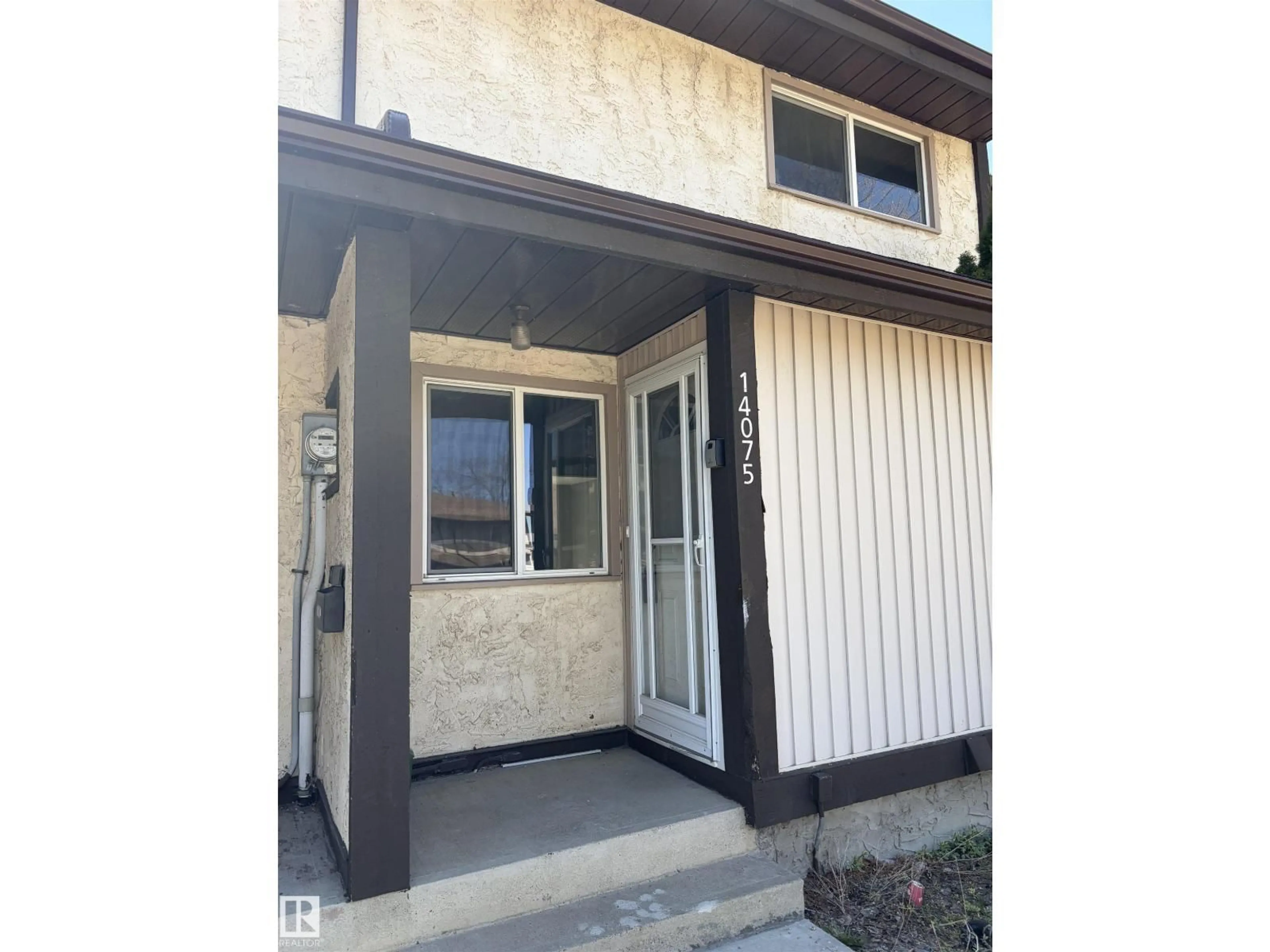 Home with vinyl exterior material, street for E NW - 14075 30 ST, Edmonton Alberta T5Y1R5
