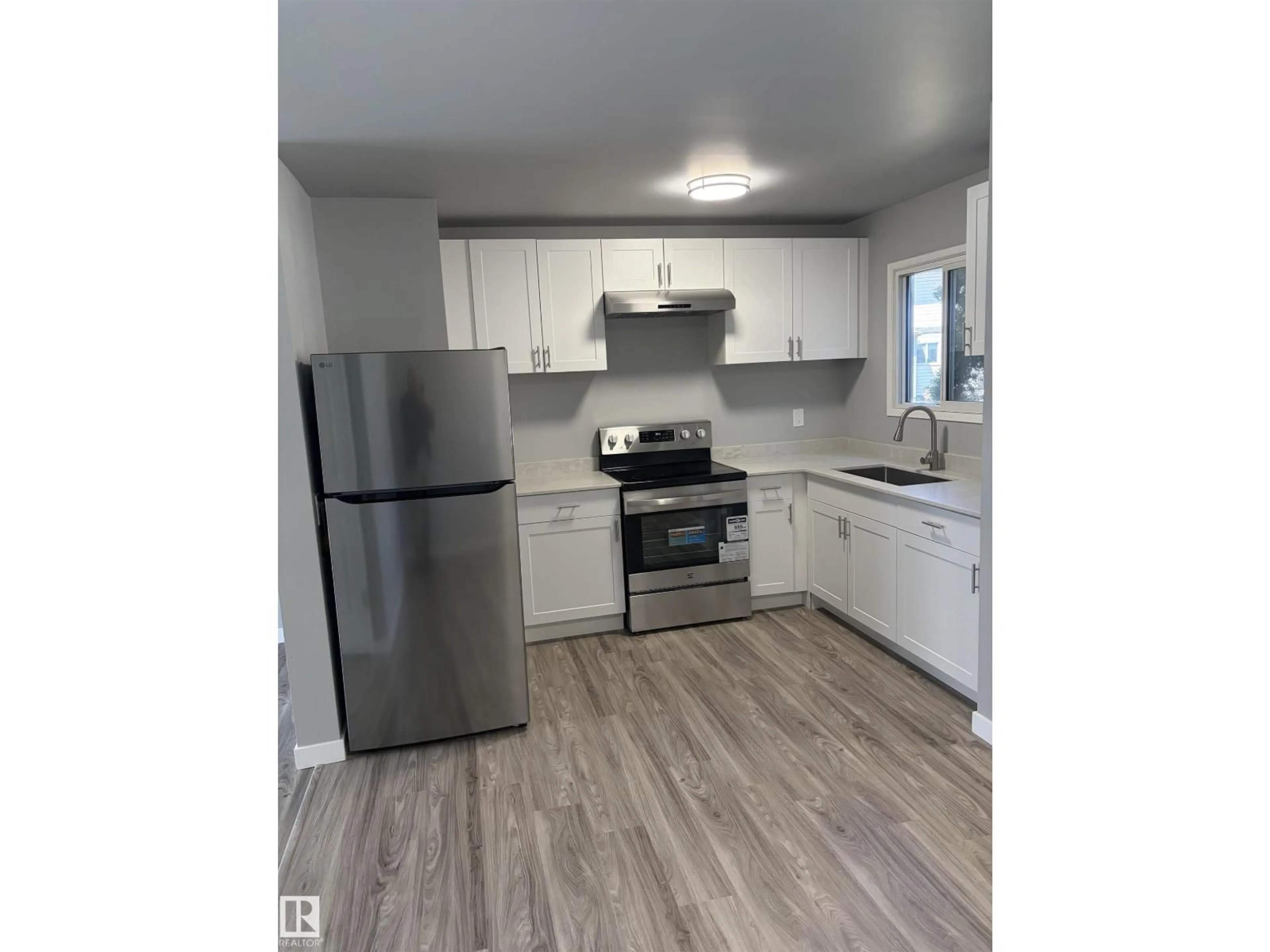Standard kitchen, wood/laminate floor for E NW - 14075 30 ST, Edmonton Alberta T5Y1R5