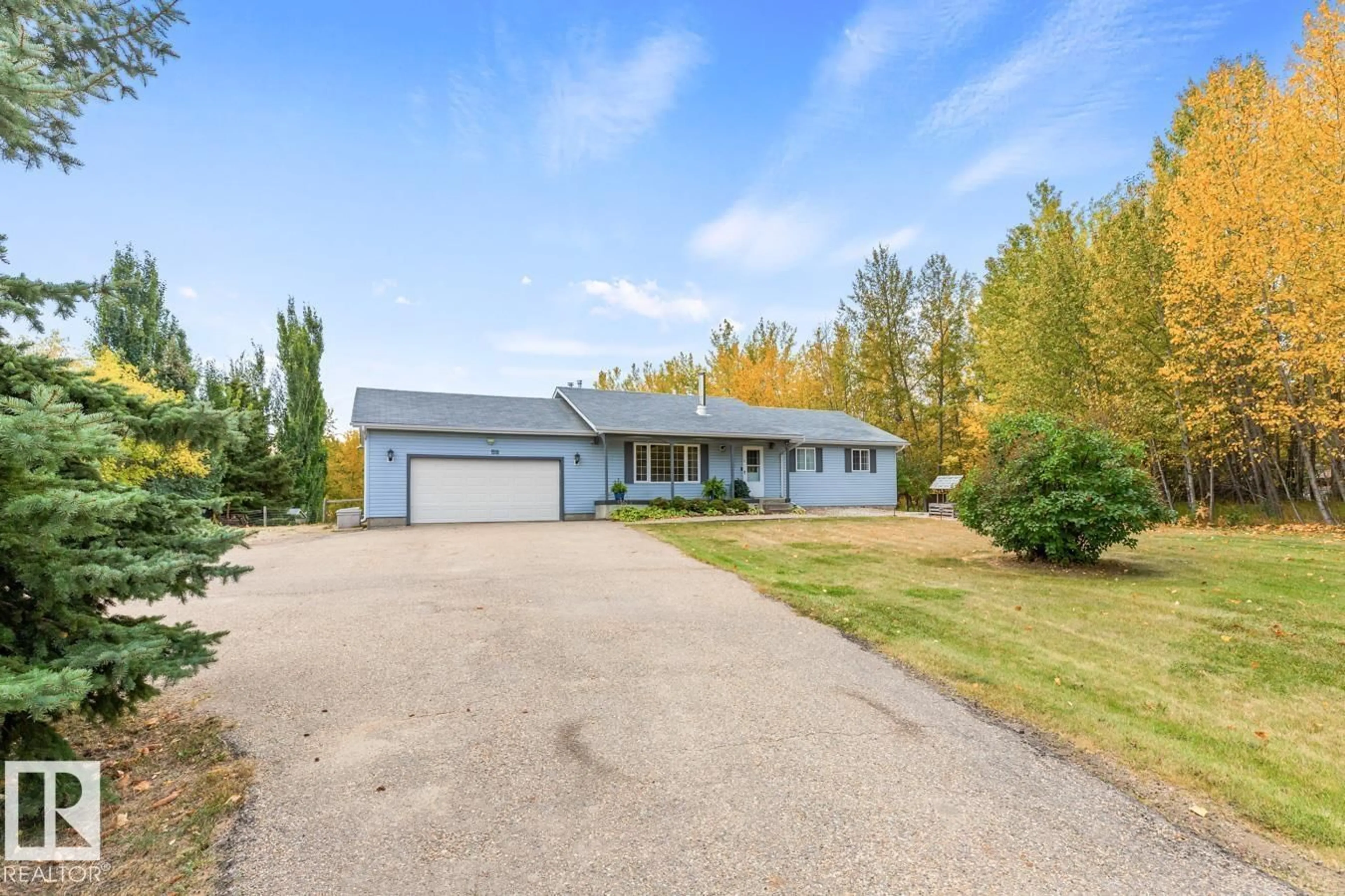 A pic from outside/outdoor area/front of a property/back of a property/a pic from drone, street for 59 - 53 RGE ROAD 14, Rural Parkland County Alberta T7Z1X2