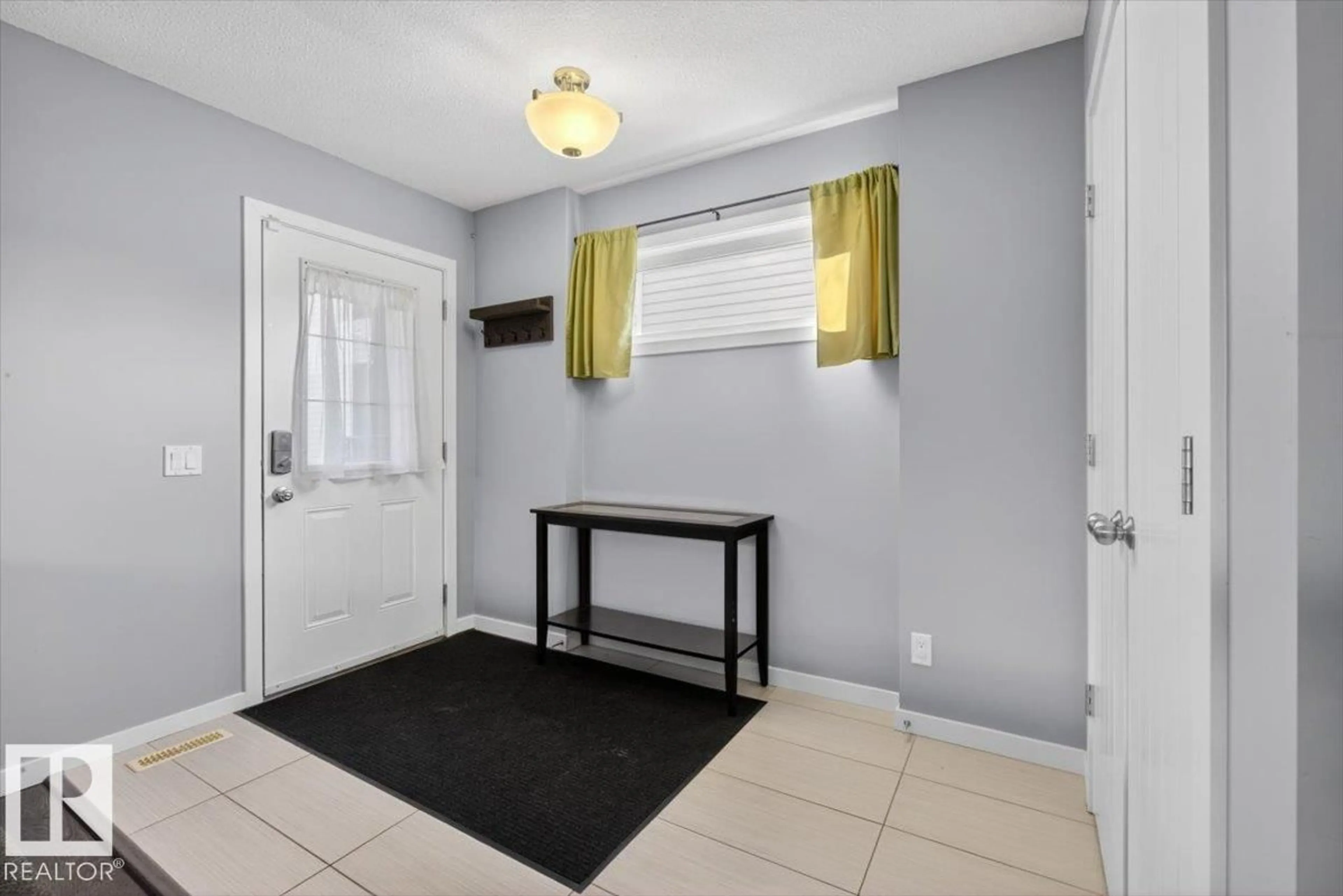 Indoor entryway for 14835 103 AV, Edmonton Alberta T5N0V2