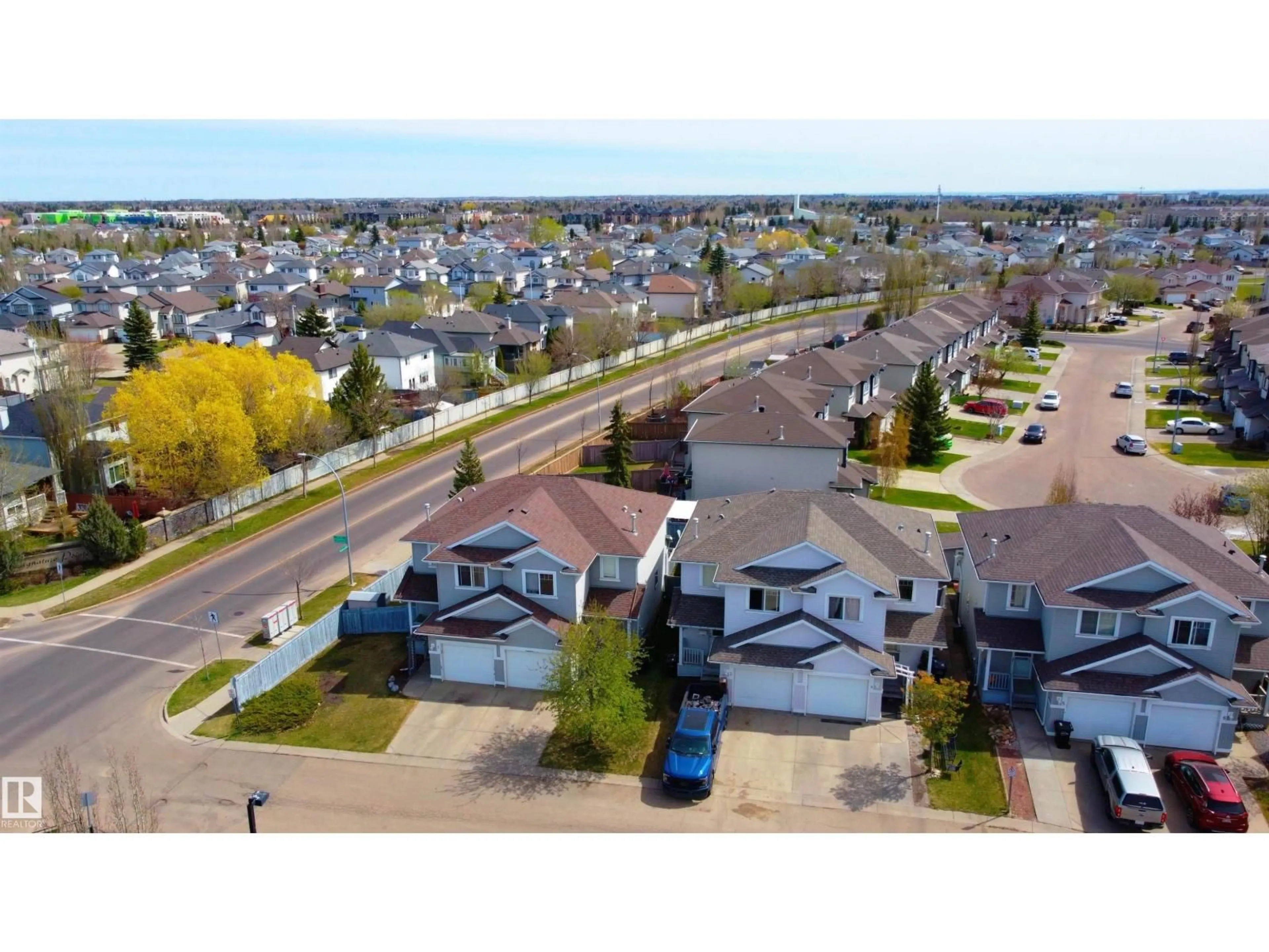 A pic from outside/outdoor area/front of a property/back of a property/a pic from drone, street for #2 - 13403 CUMBERLAND RD, Edmonton Alberta T6V1P9