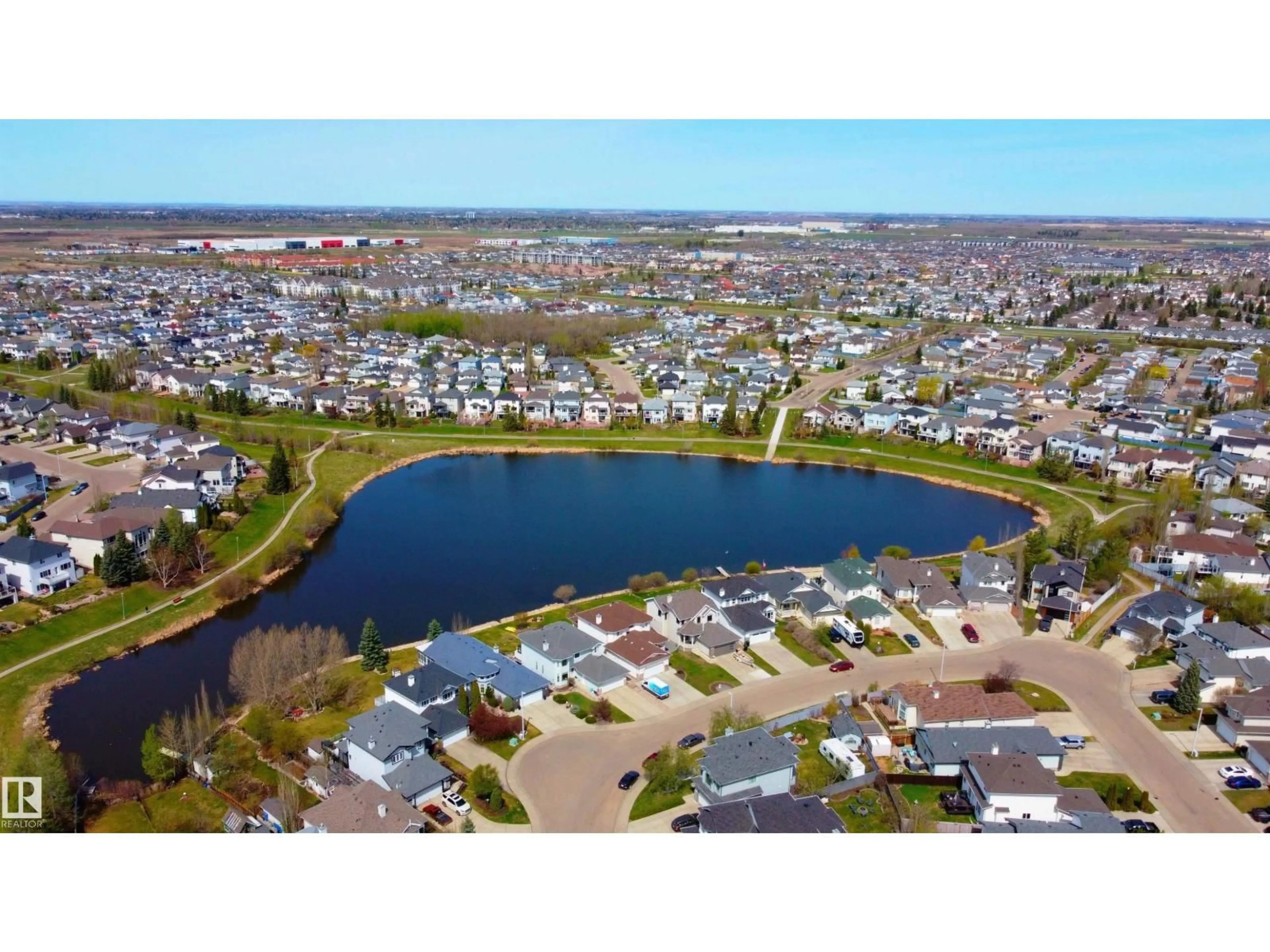 A pic from outside/outdoor area/front of a property/back of a property/a pic from drone, water/lake/river/ocean view for #2 - 13403 CUMBERLAND RD, Edmonton Alberta T6V1P9