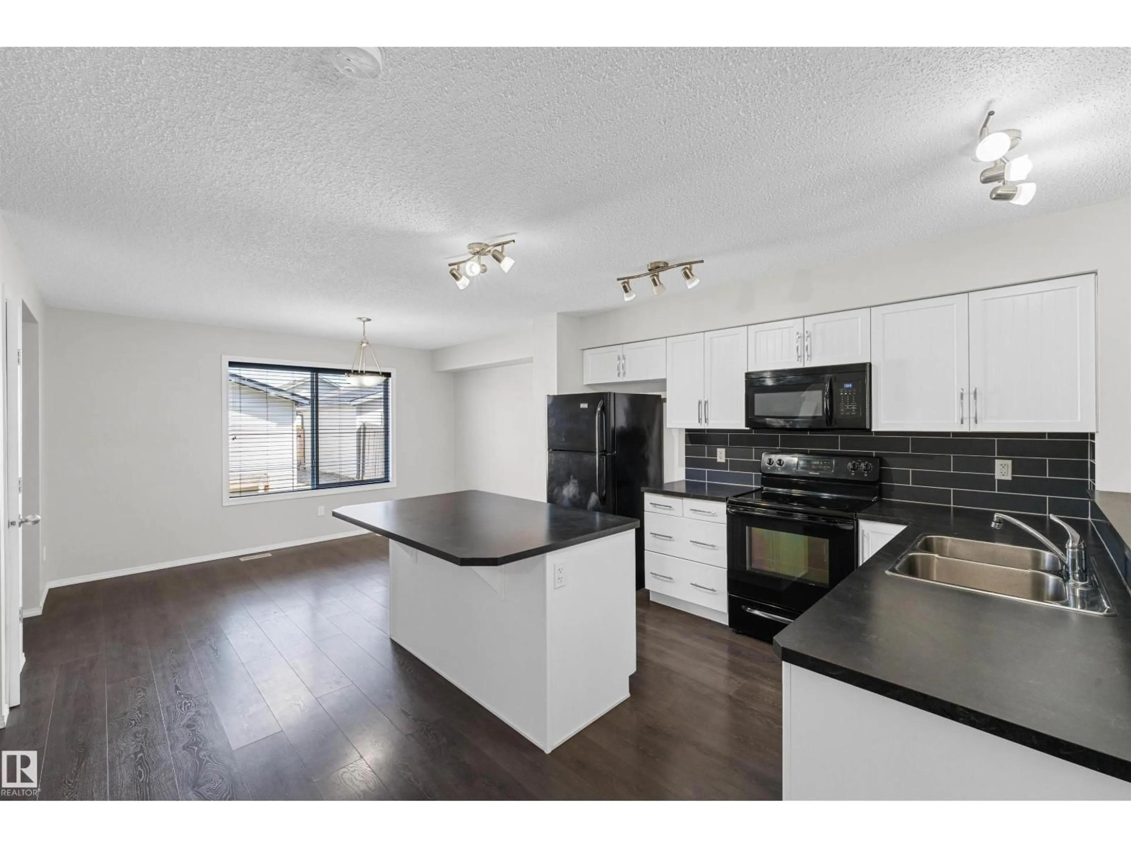 Open concept kitchen, unknown for SW - 3041 ARTHURS CR, Edmonton Alberta T6W2H8