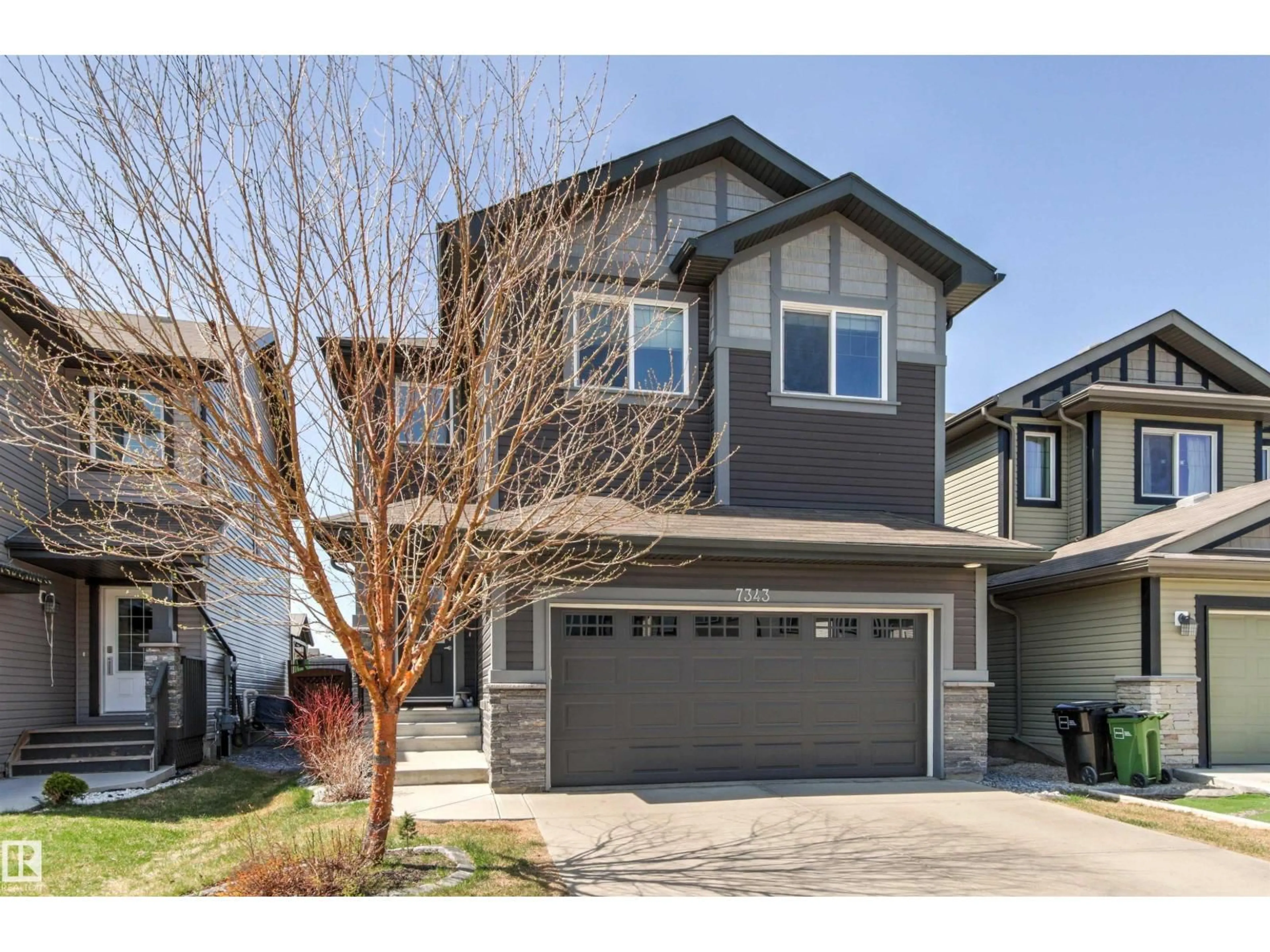 Home with vinyl exterior material, street for 7343 ARMOUR CR, Edmonton Alberta T6W2S2