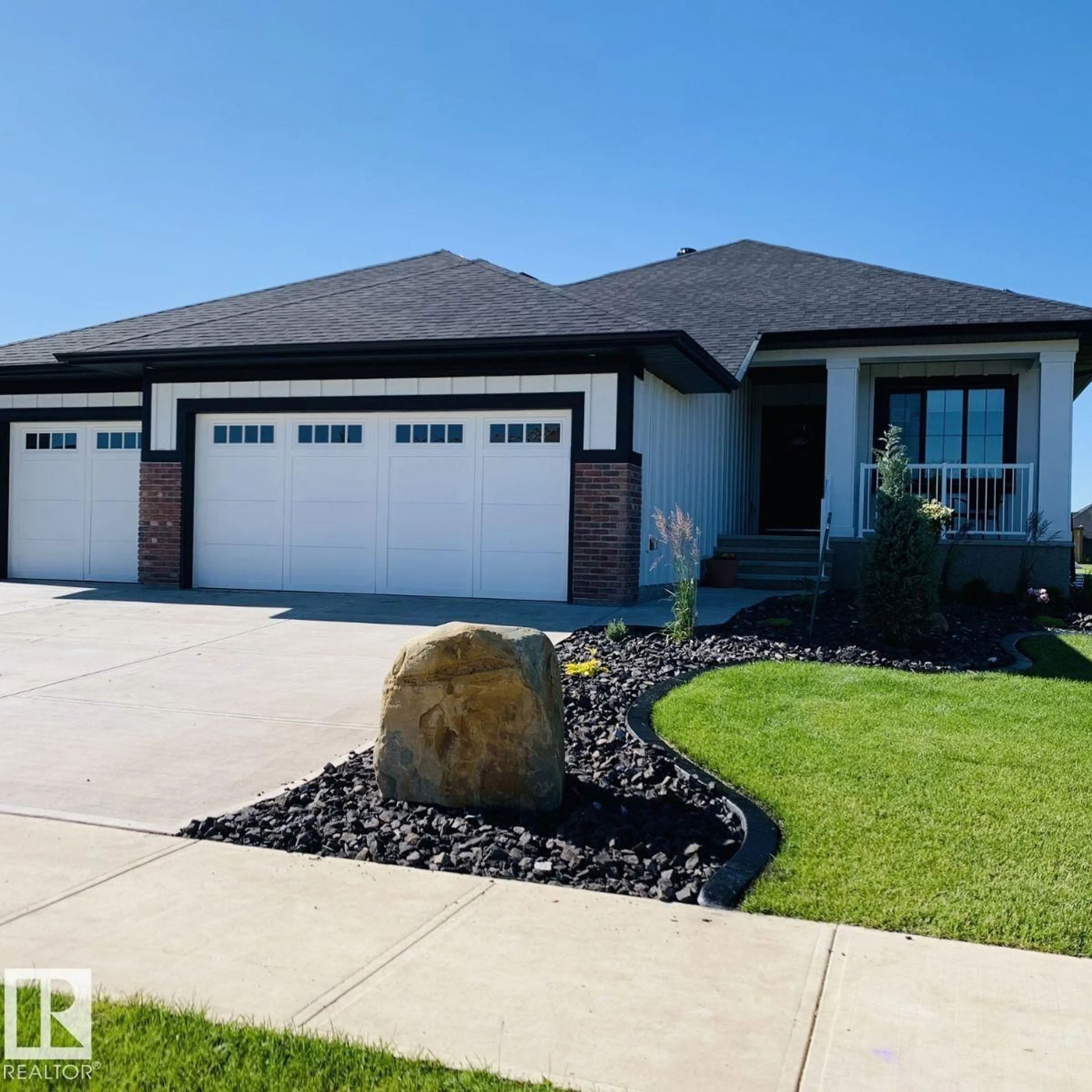 Home with vinyl exterior material, street for 45 HARVEST CR, Ardrossan Alberta T8E0A8