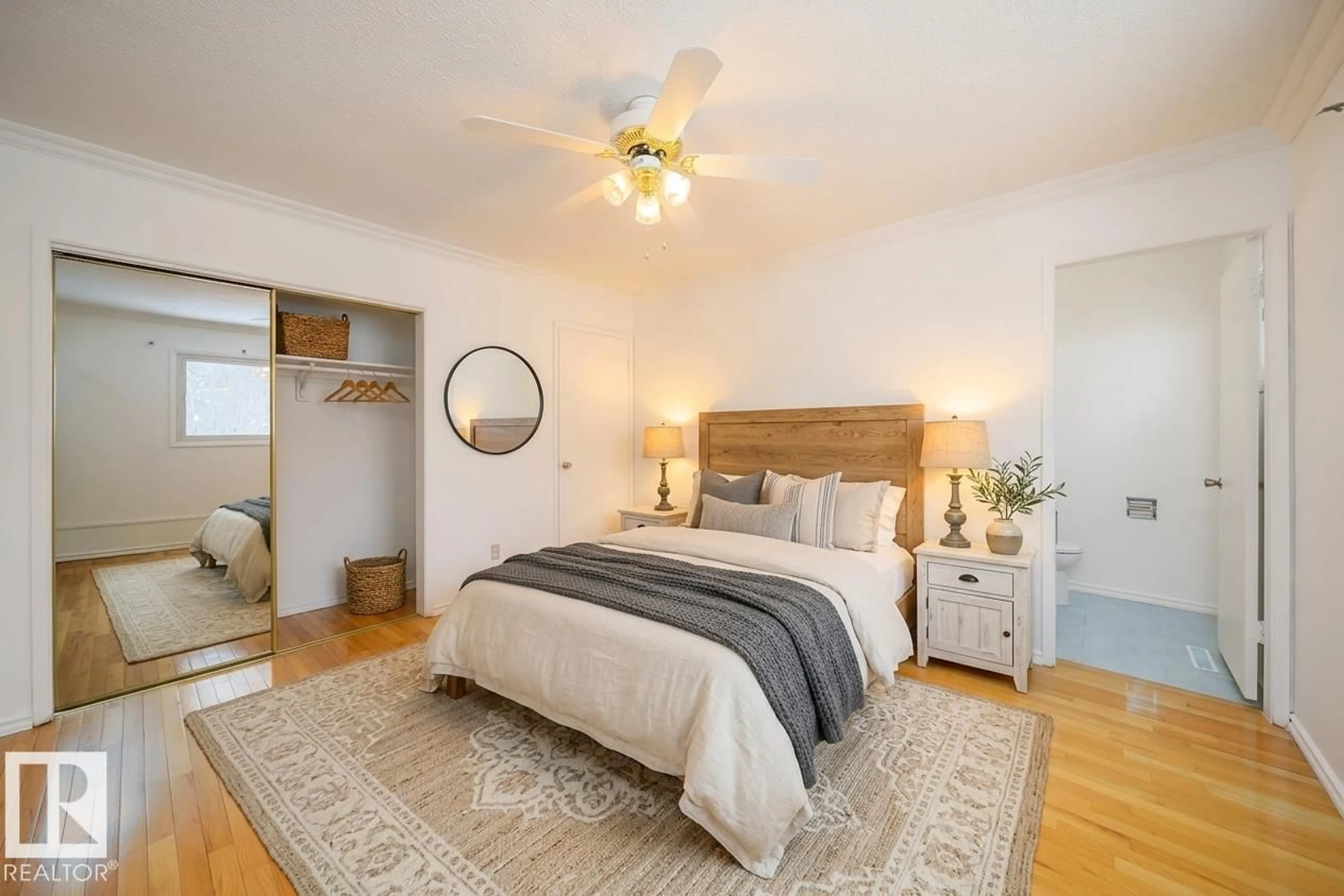 Bedroom with bed, wood/laminate floor for NW - 6411 149 STREET ST, Edmonton Alberta T5A1W1
