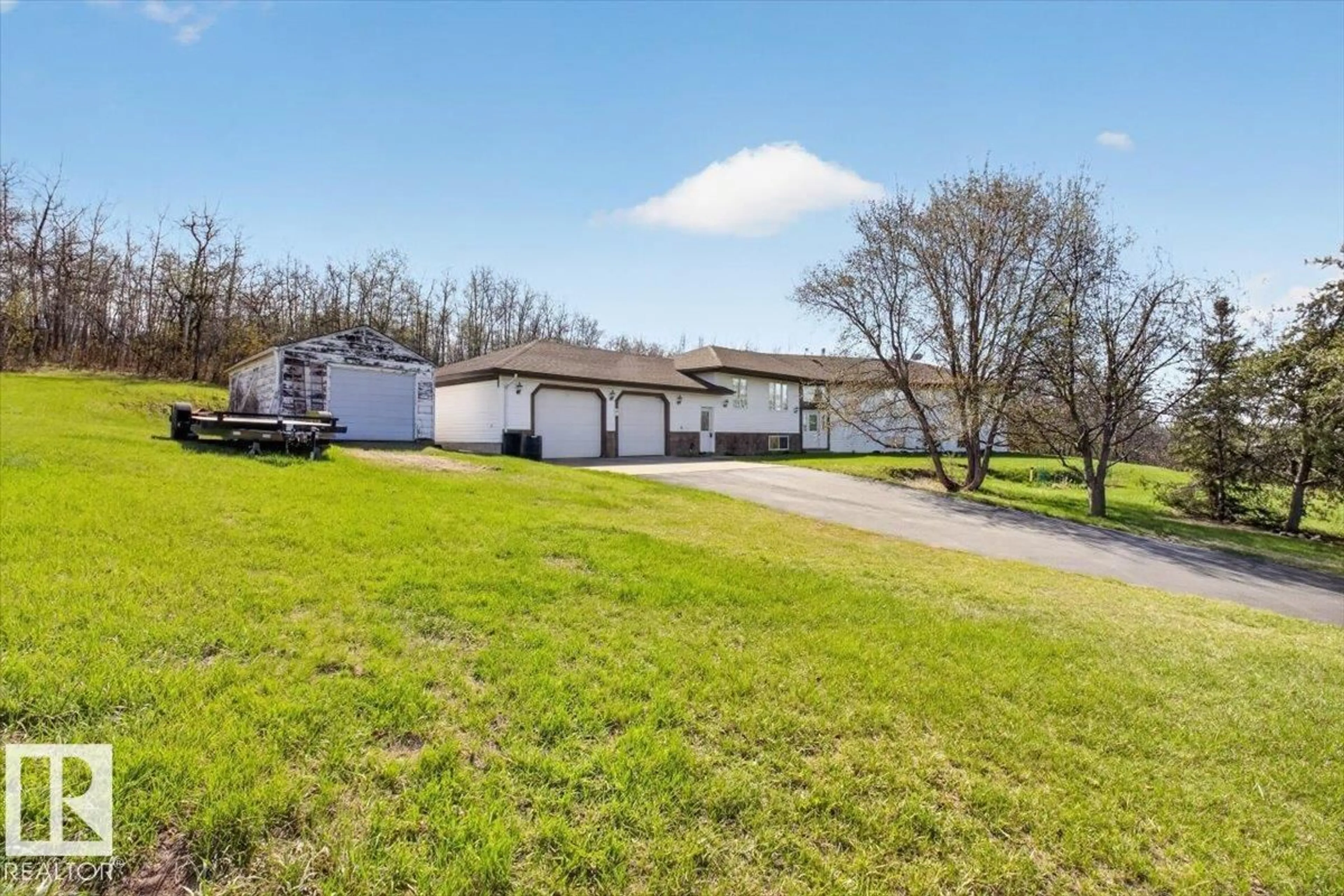 A pic from outside/outdoor area/front of a property/back of a property/a pic from drone, water/lake/river/ocean view for 23 23114A TWP ROAD 564, Rural Sturgeon County Alberta T0A1N0