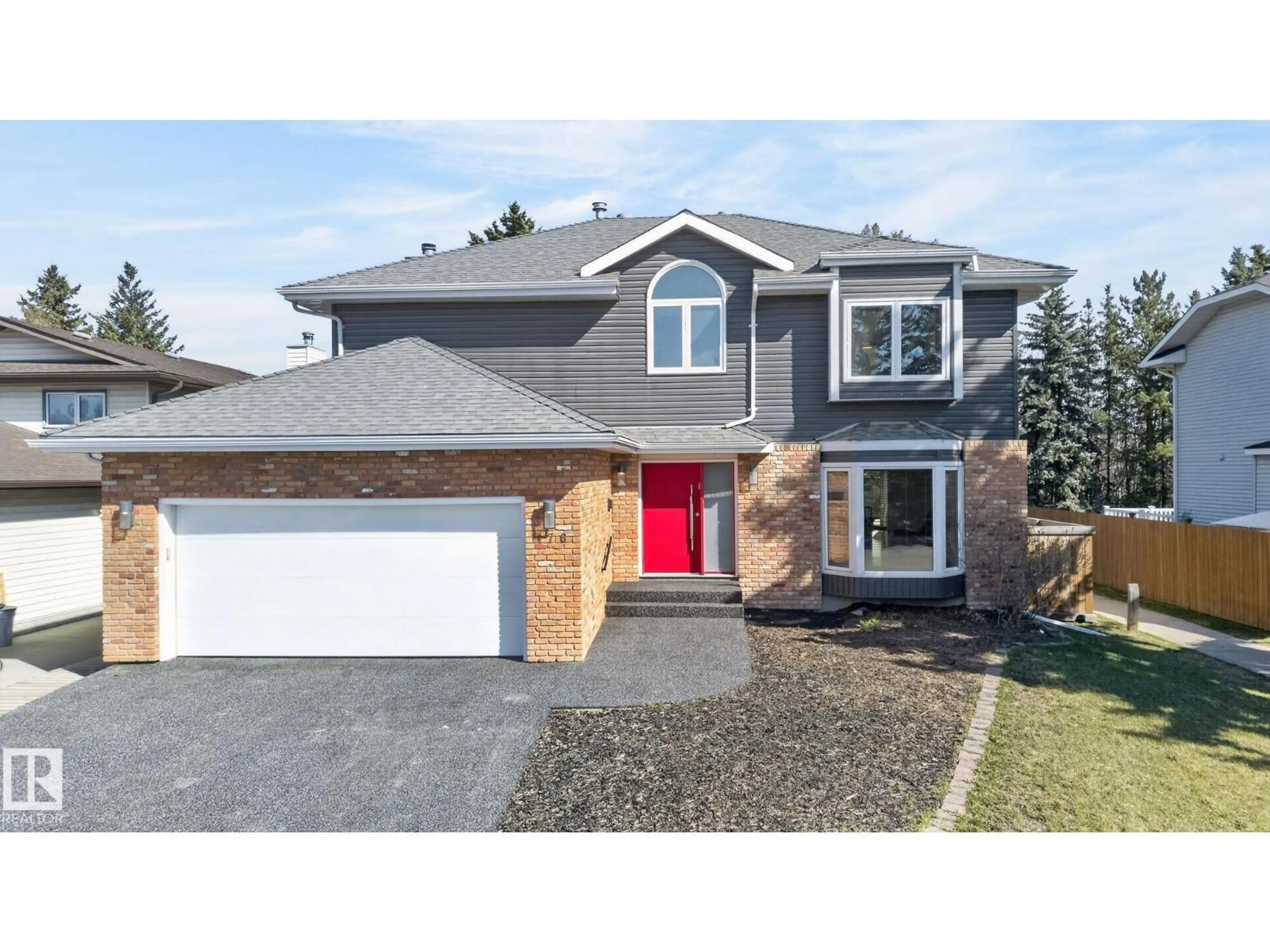 Home with vinyl exterior material, street for 176 WAYGOOD RD, Edmonton Alberta T5T5M4