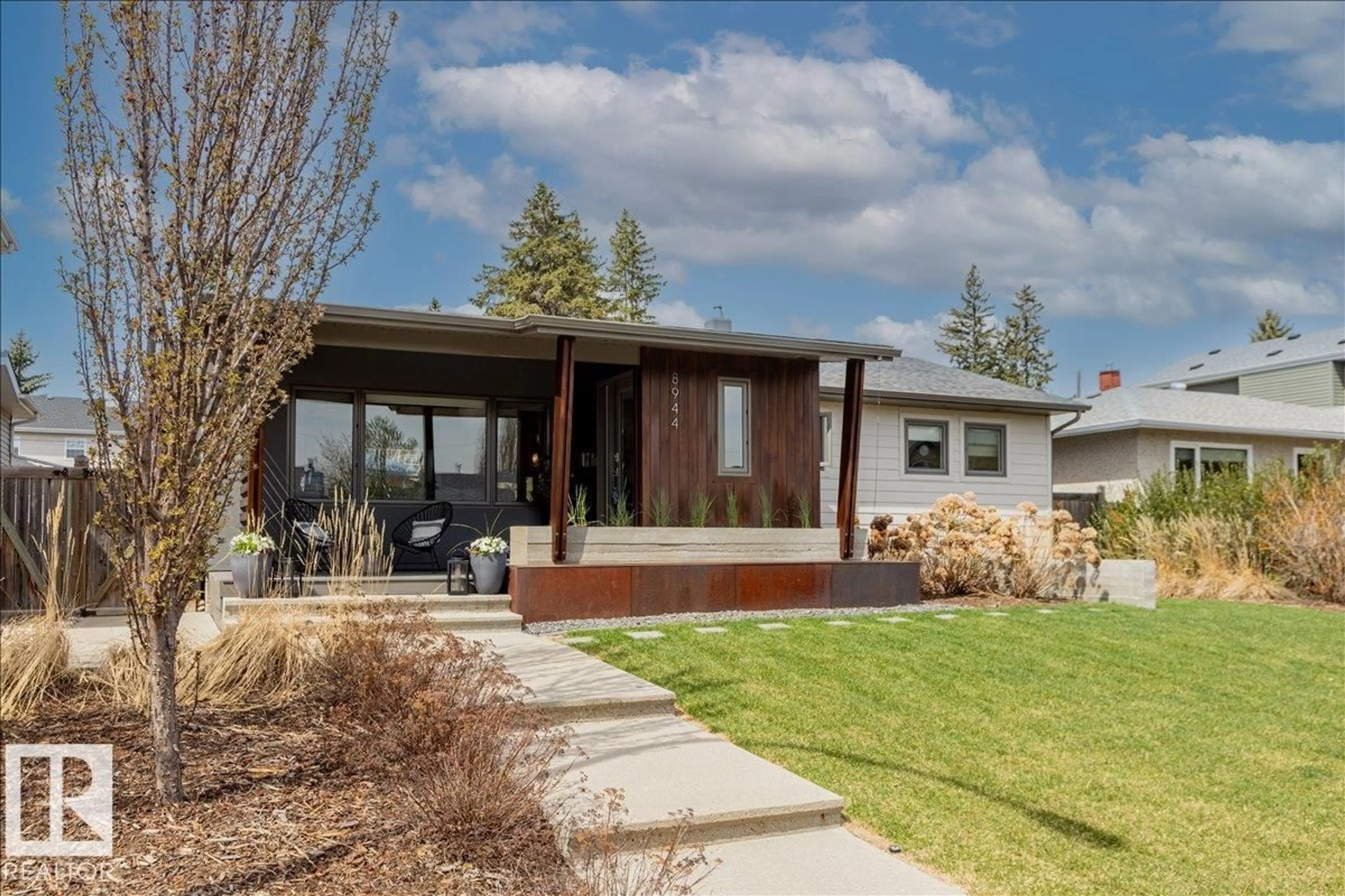 Home with vinyl exterior material, street for NW - 8944 146A ST, Edmonton Alberta T5R0X1