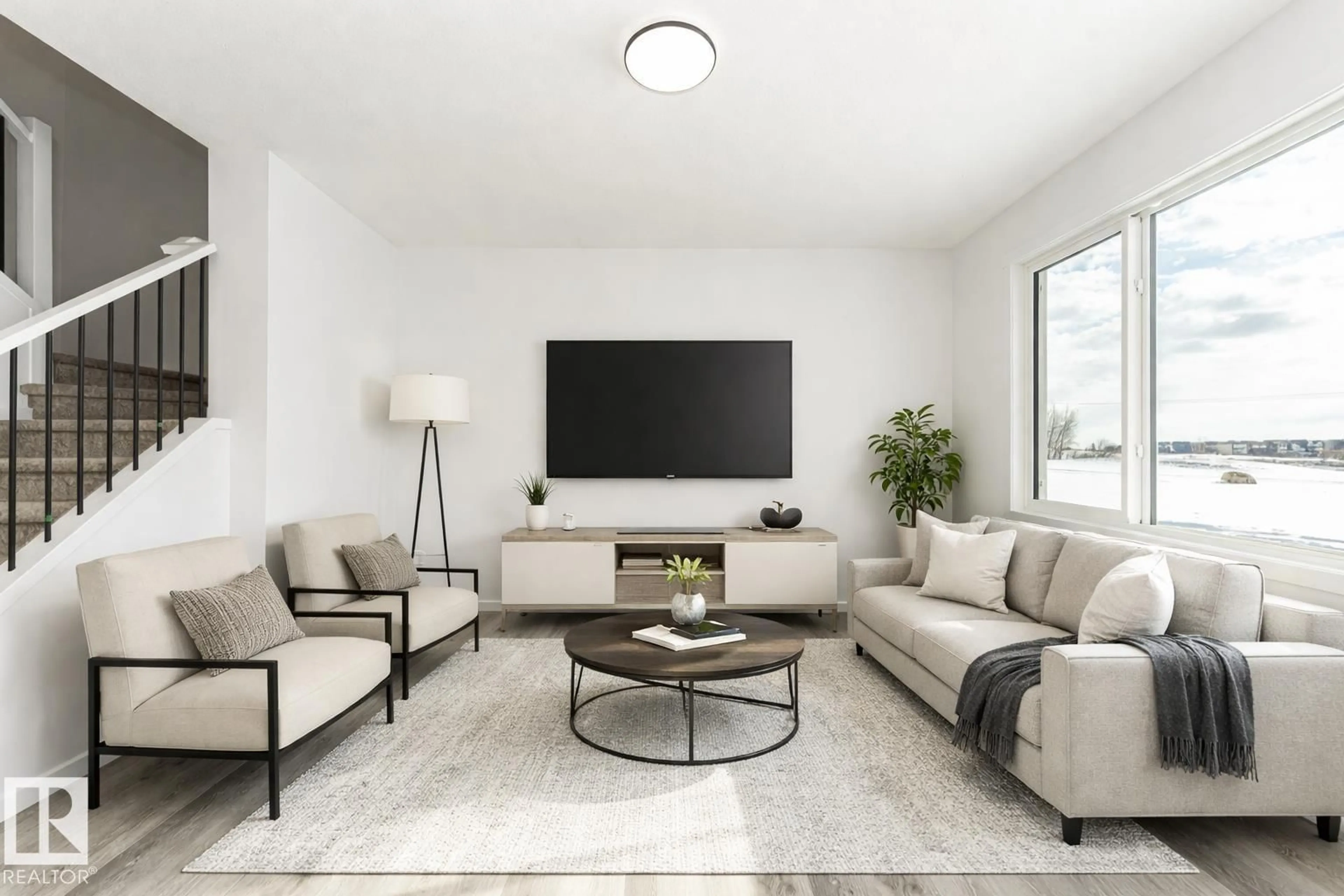 Living room with furniture, unknown for 6271 180 AV, Edmonton Alberta T5Y4L8