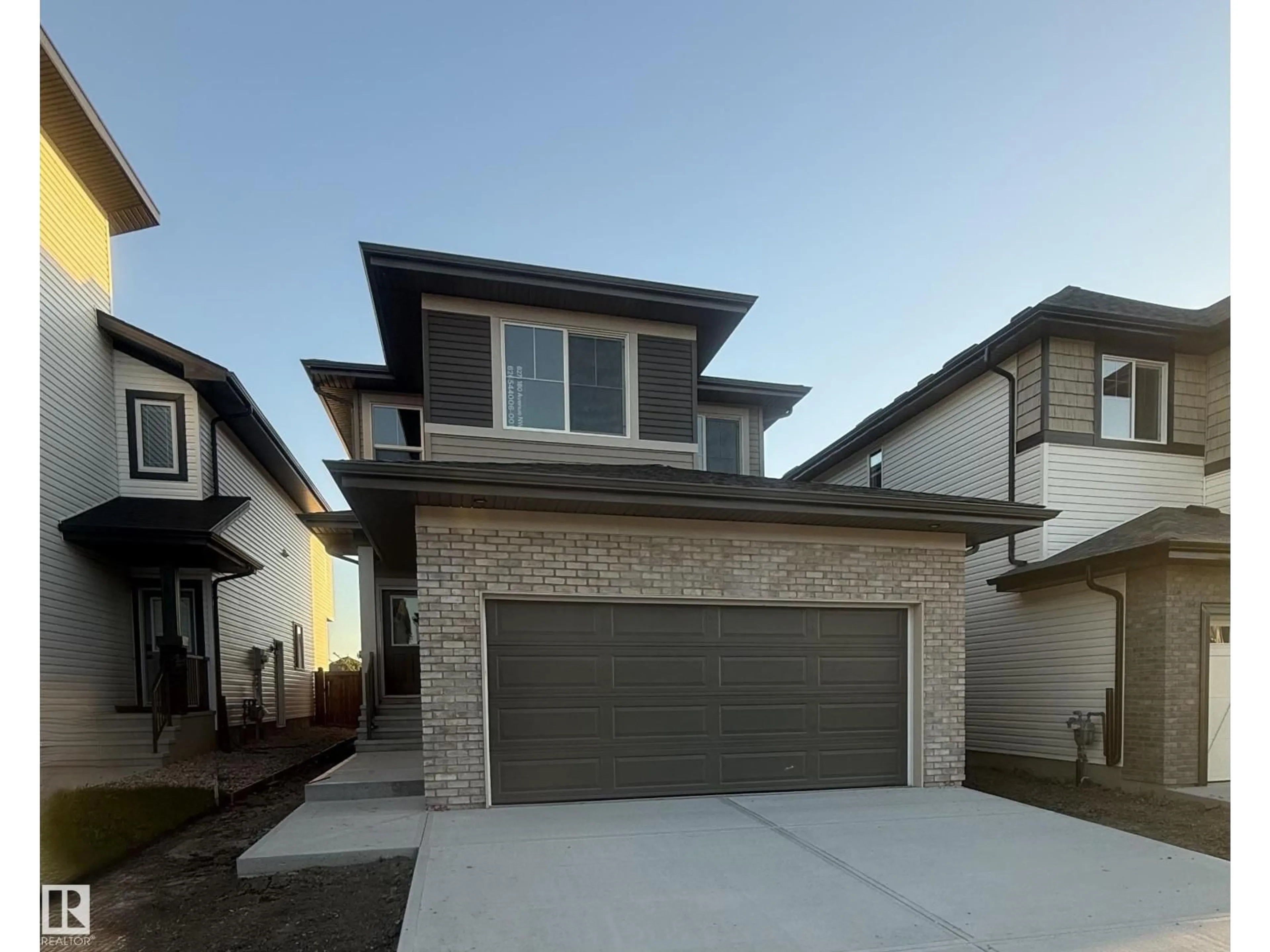 Home with brick exterior material, street for 6271 180 AV, Edmonton Alberta T5Y4L8