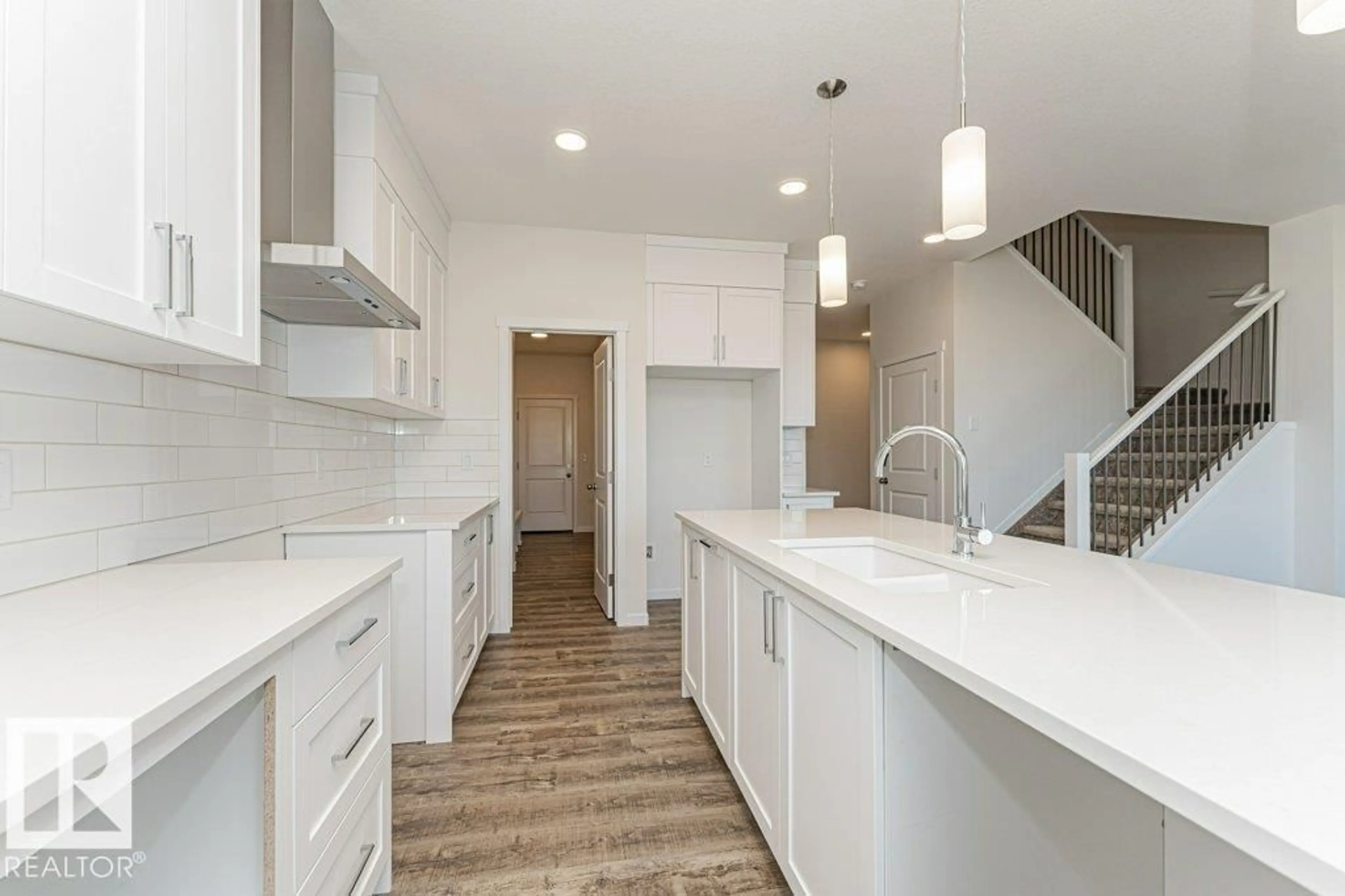 Open concept kitchen, ceramic/tile floor for 6271 180 AV, Edmonton Alberta T5Y4L8
