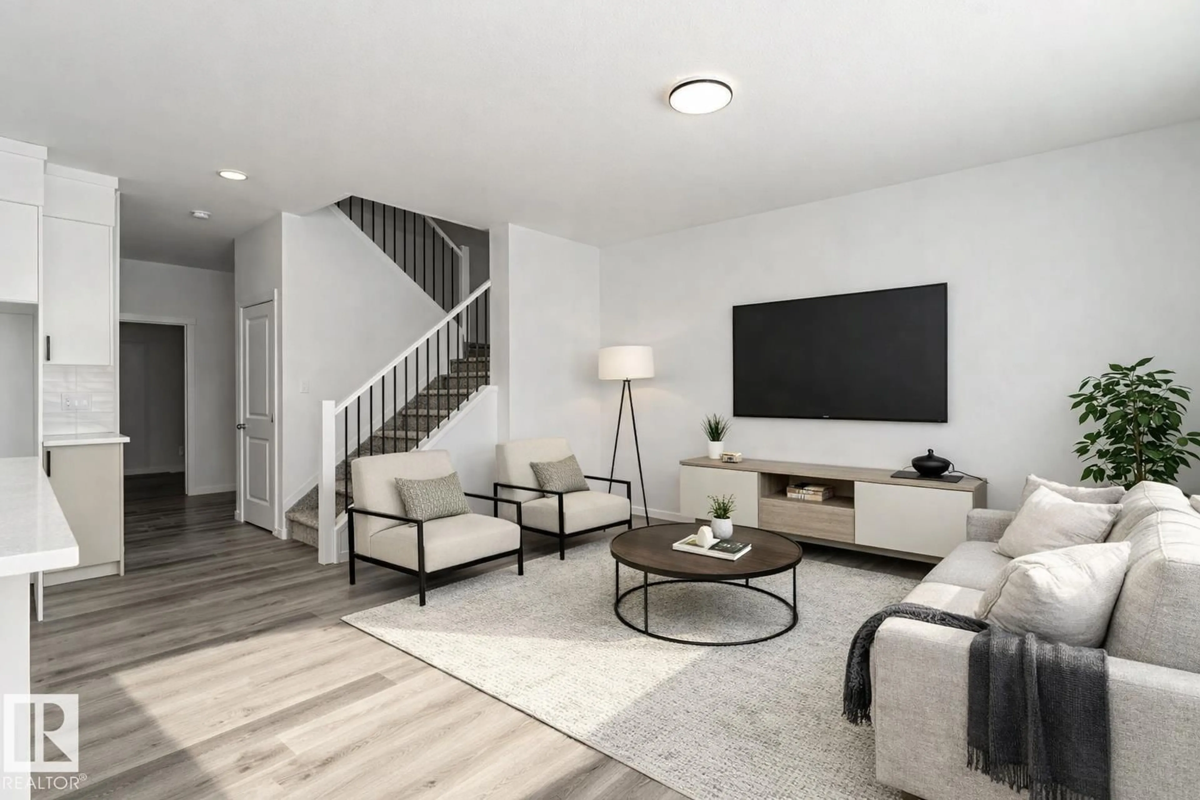 Living room with furniture, unknown for 6271 180 AV, Edmonton Alberta T5Y4L8
