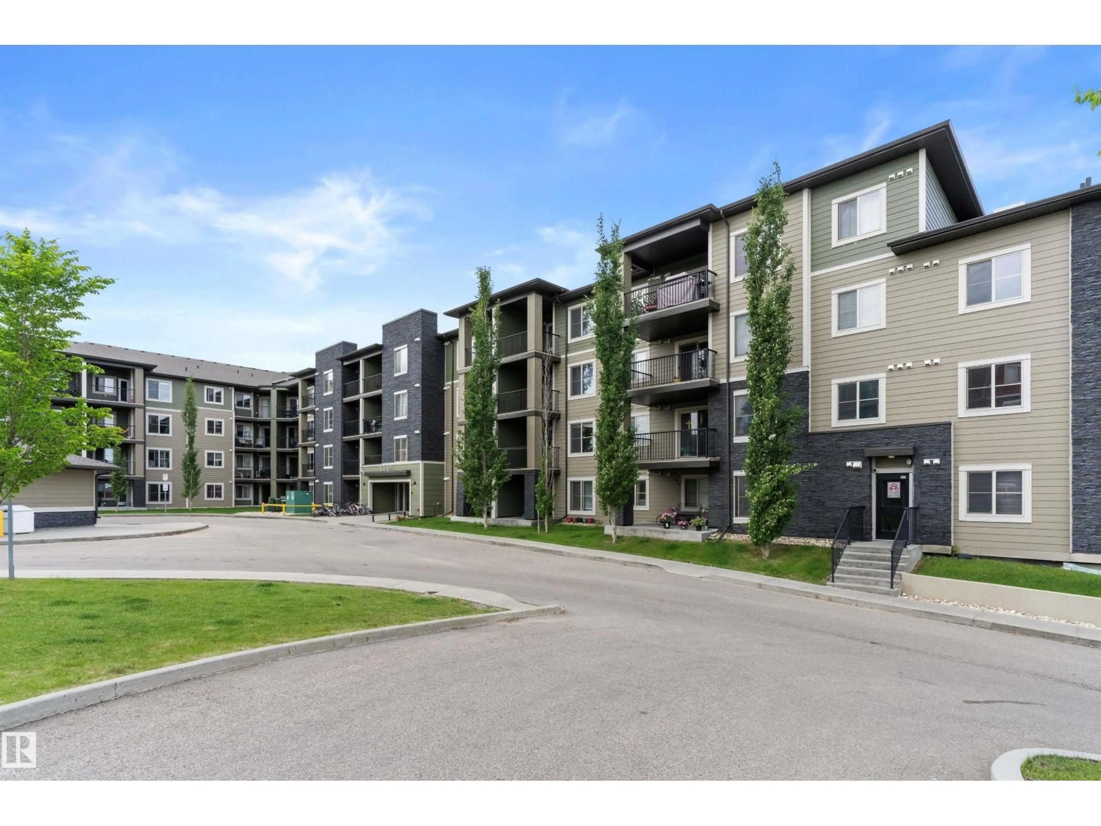 A pic from outside/outdoor area/front of a property/back of a property/a pic from drone, unknown for 105 111 WATT CM, Edmonton Alberta T6X2C6