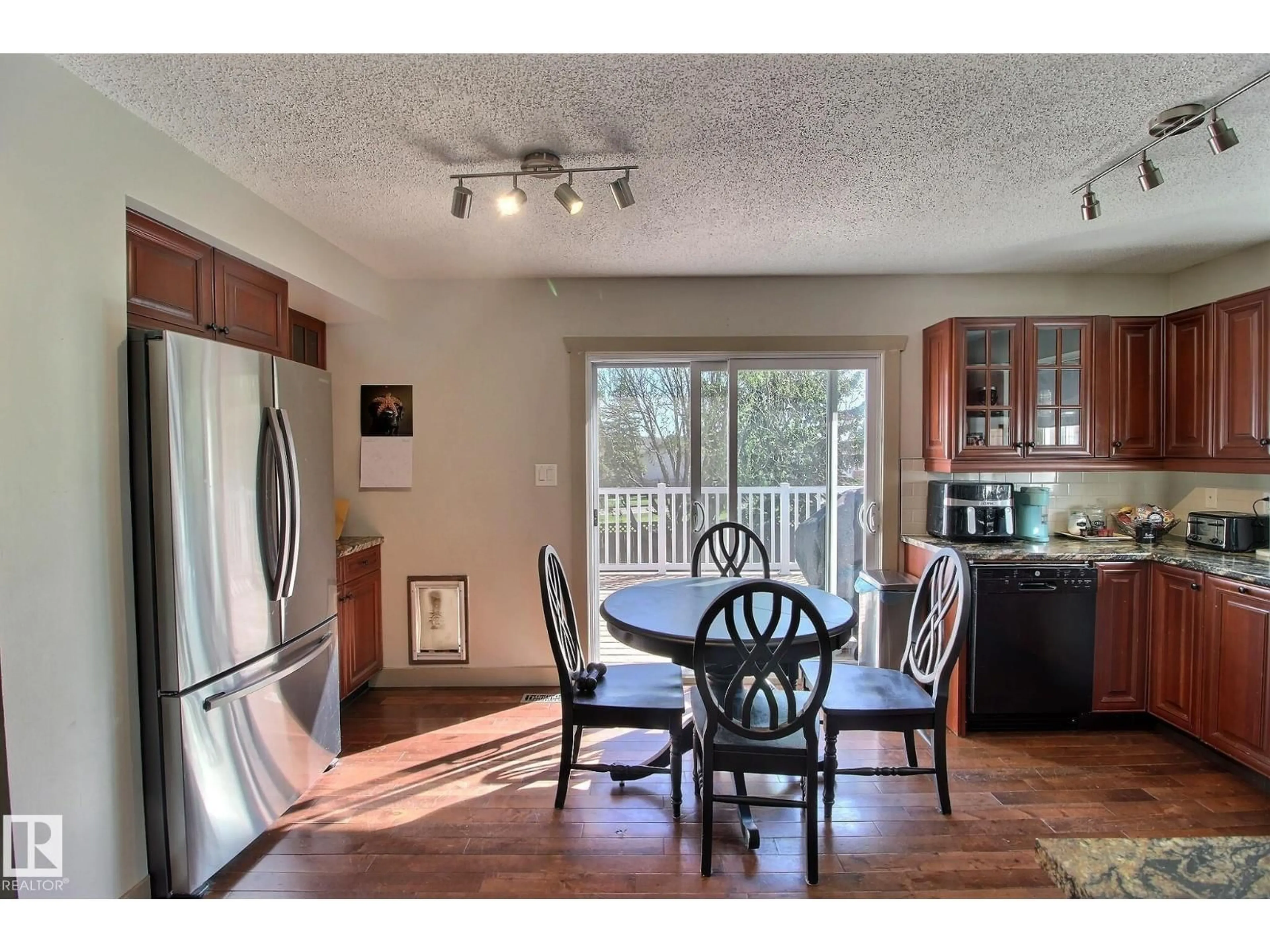 Open concept kitchen, wood/laminate floor for 114 WESTBOURNE RD, Spruce Grove Alberta T7X1R6