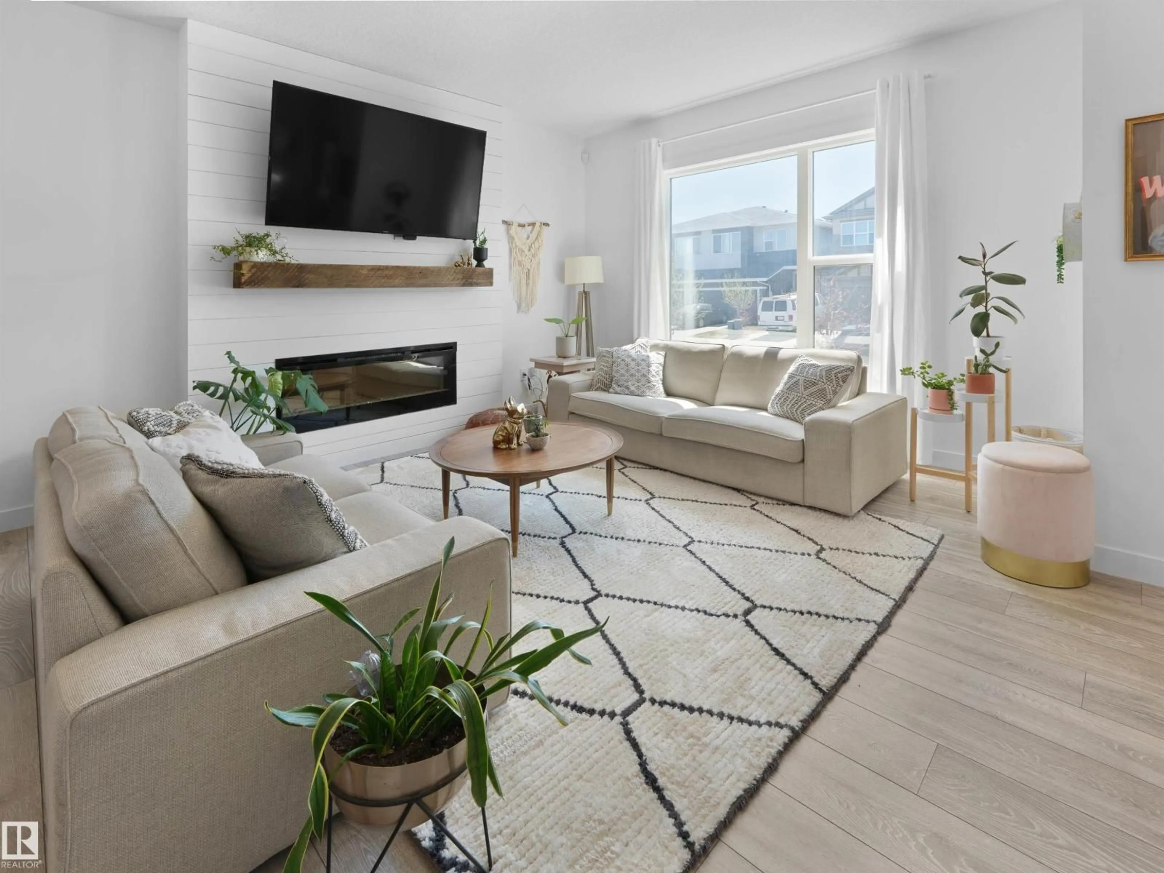 Living room with furniture, unknown for 3608 8 AV, Edmonton Alberta T6X2G6