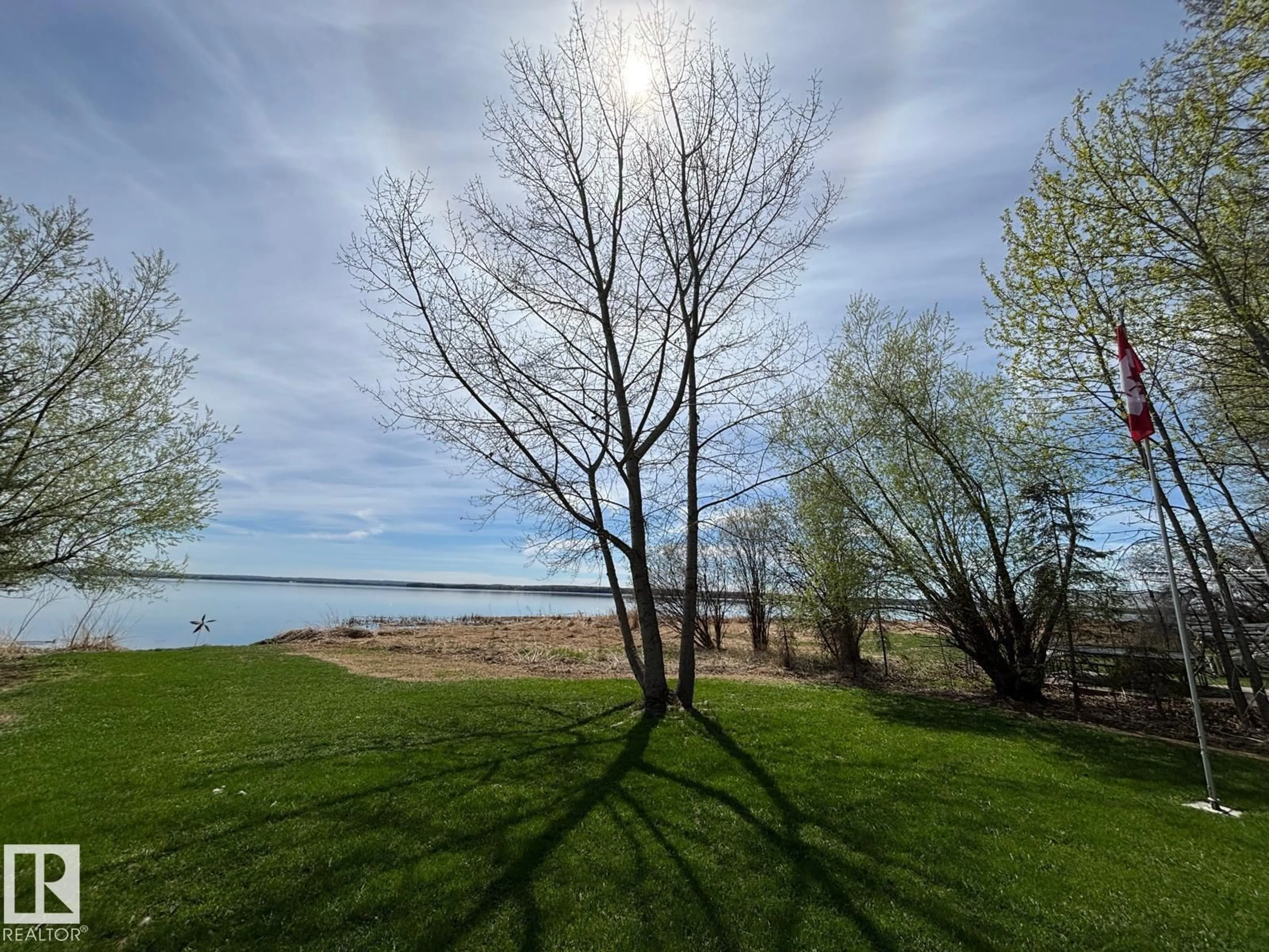 A pic from outside/outdoor area/front of a property/back of a property/a pic from drone, water/lake/river/ocean view for 465022 - 41 RANGE ROAD 62, Rural Wetaskiwin County Alberta T0C0T0
