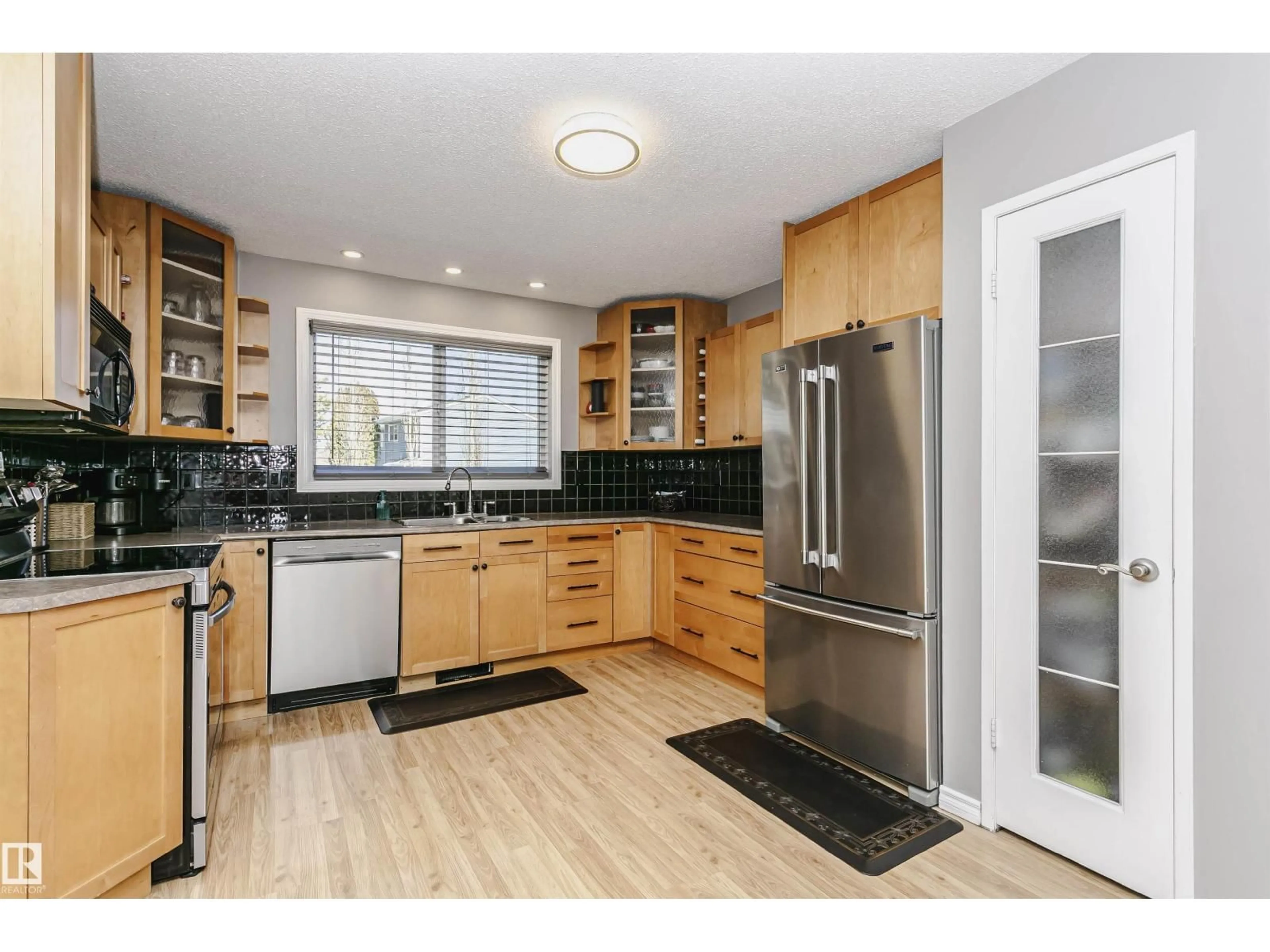 Open concept kitchen, unknown for NW - 1044 106 ST, Edmonton Alberta T6J6G8