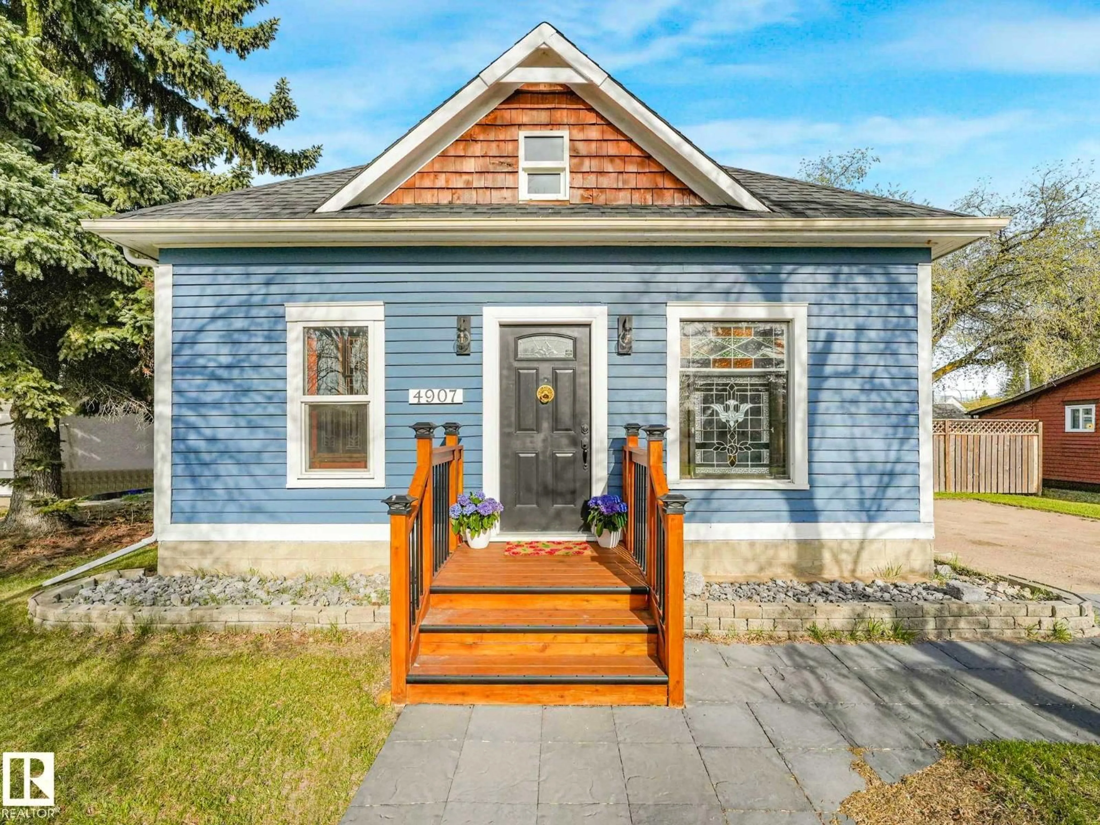 Home with vinyl exterior material, street for 4907 50 ST, Bruderheim Alberta T0B0S0