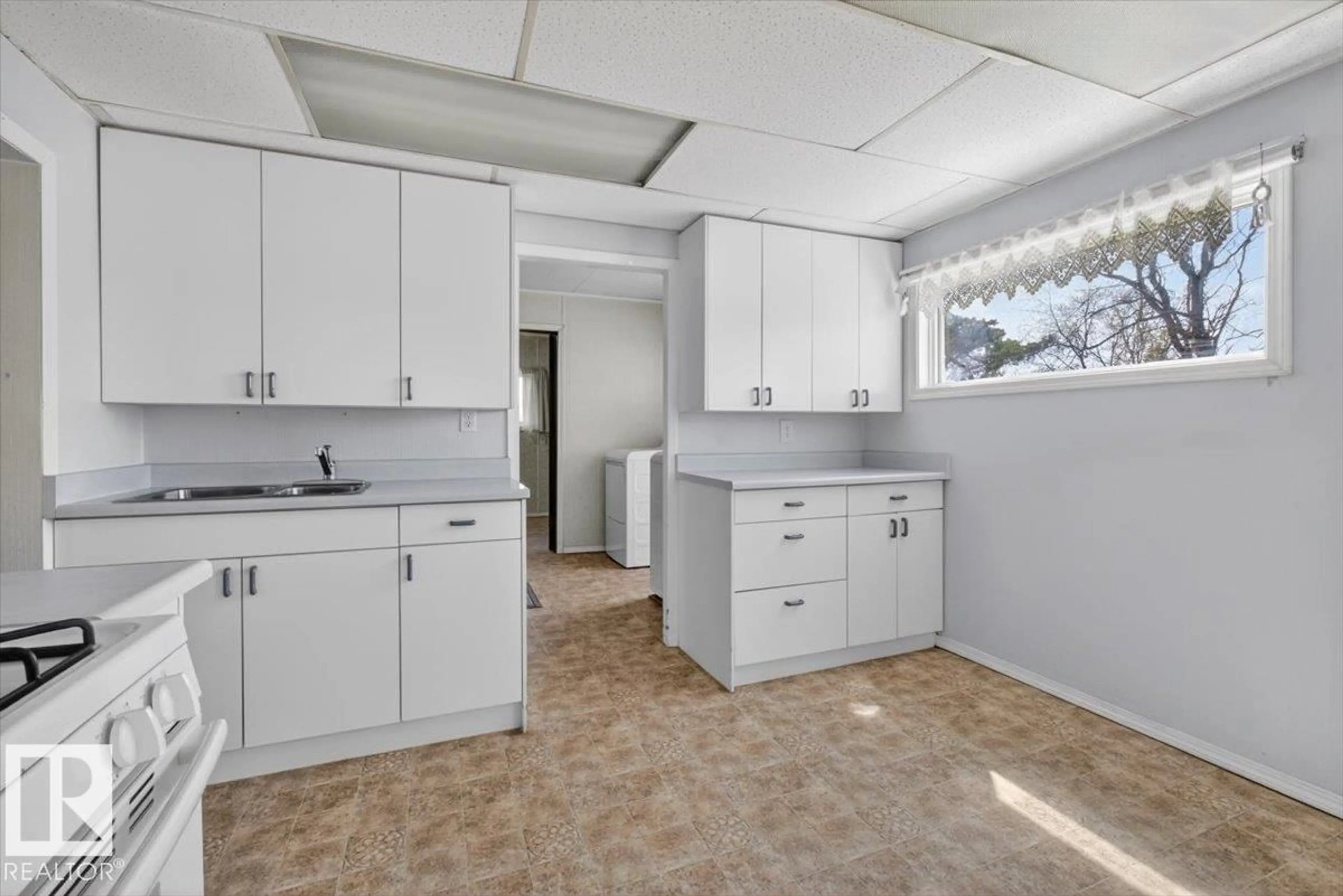 Standard kitchen, ceramic/tile floor for 4803 51 ST, Gibbons Alberta T0A1N0